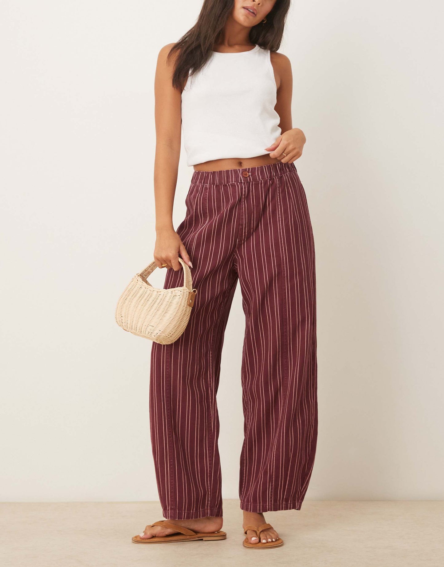 ASOS DESIGN laundered pull on barrel trousers in burgundy stripe