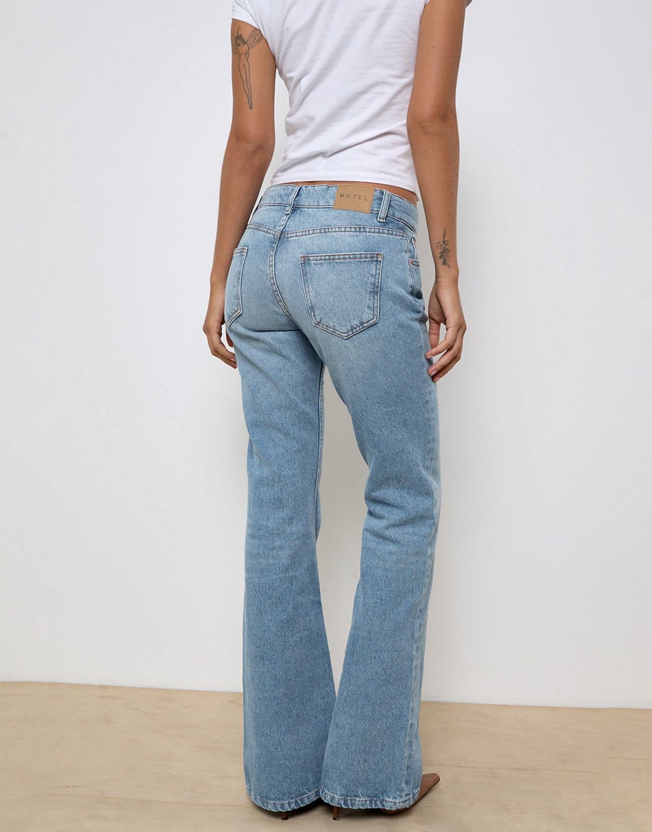 Motel rigid low rise flare jeans in bright blue used