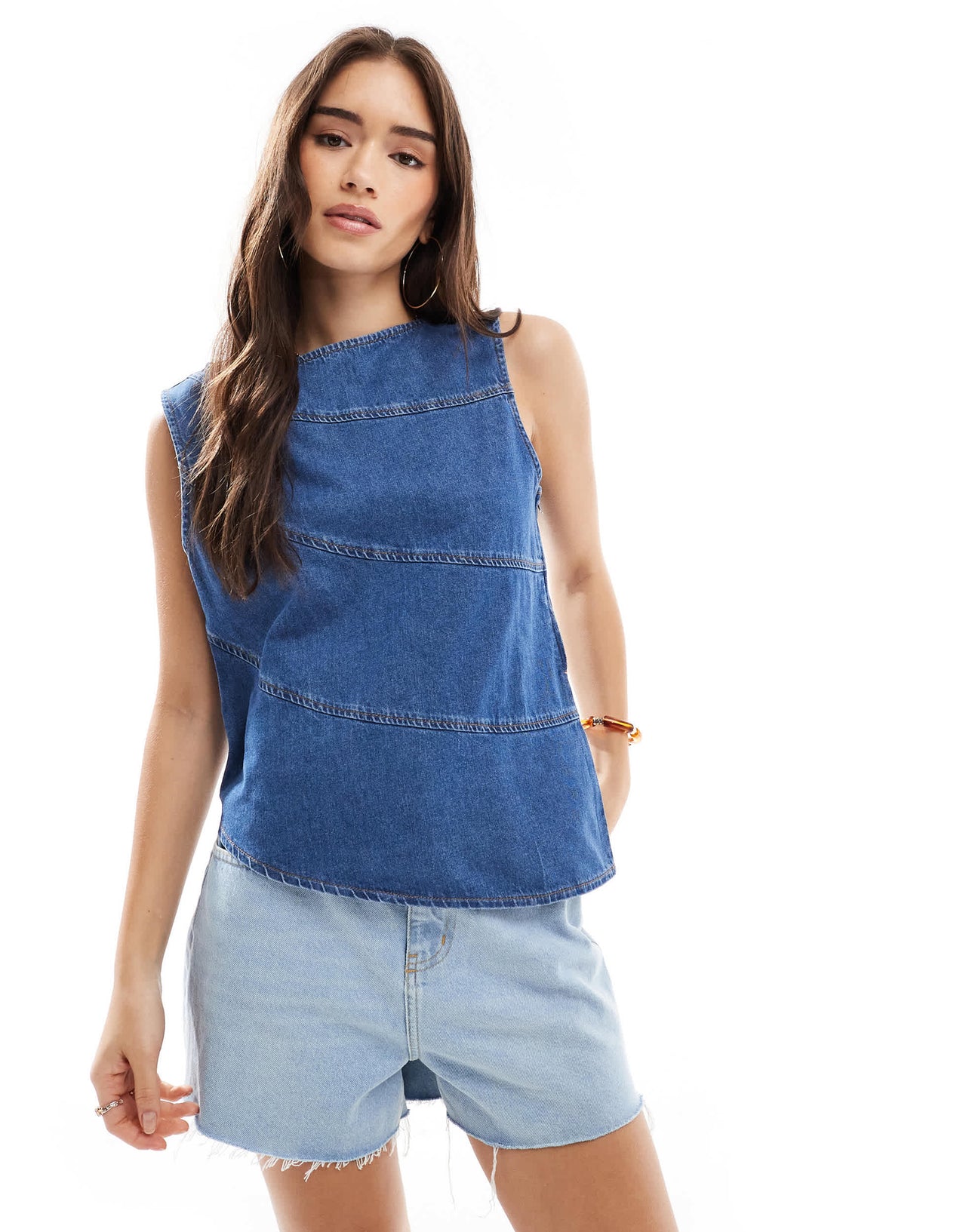 ASOS DESIGN asymmetric denim top with exposed seams in mid blue