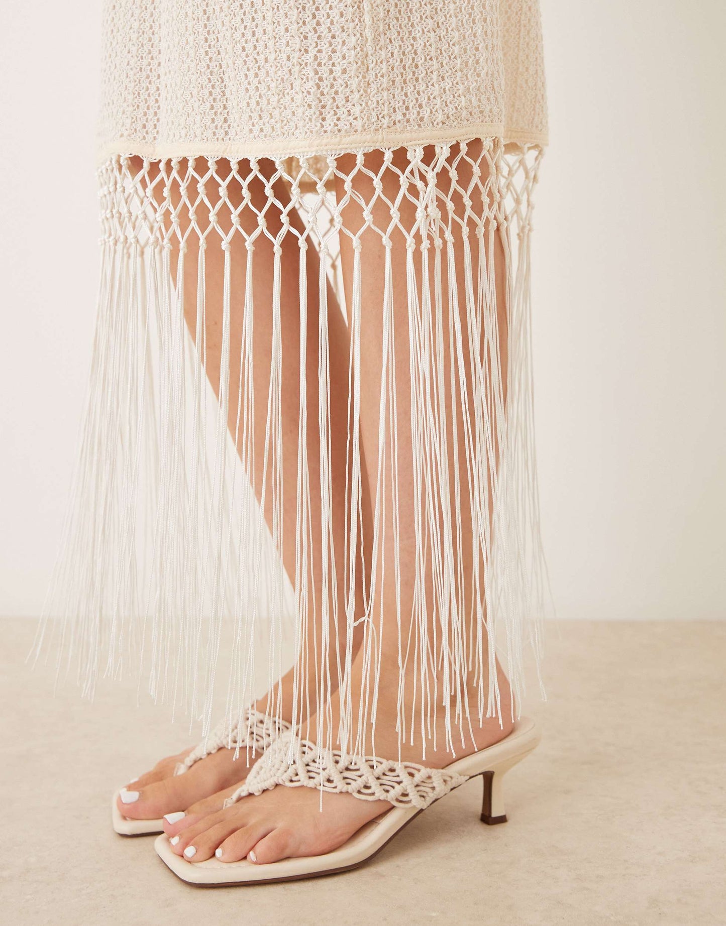 Amy Lynn backless crochet midi dress with fringe trim in cream