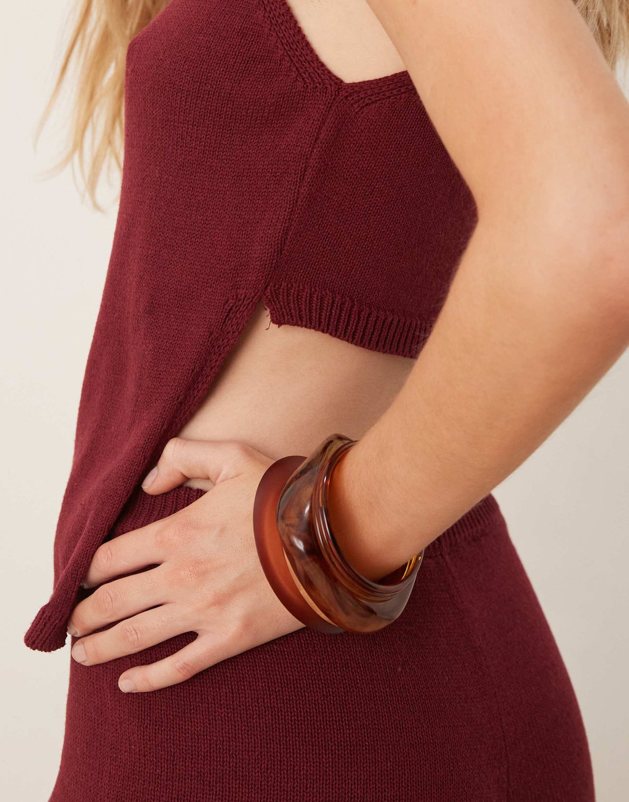 ASOS DESIGN knitted racer top with angled front panel in burgundy