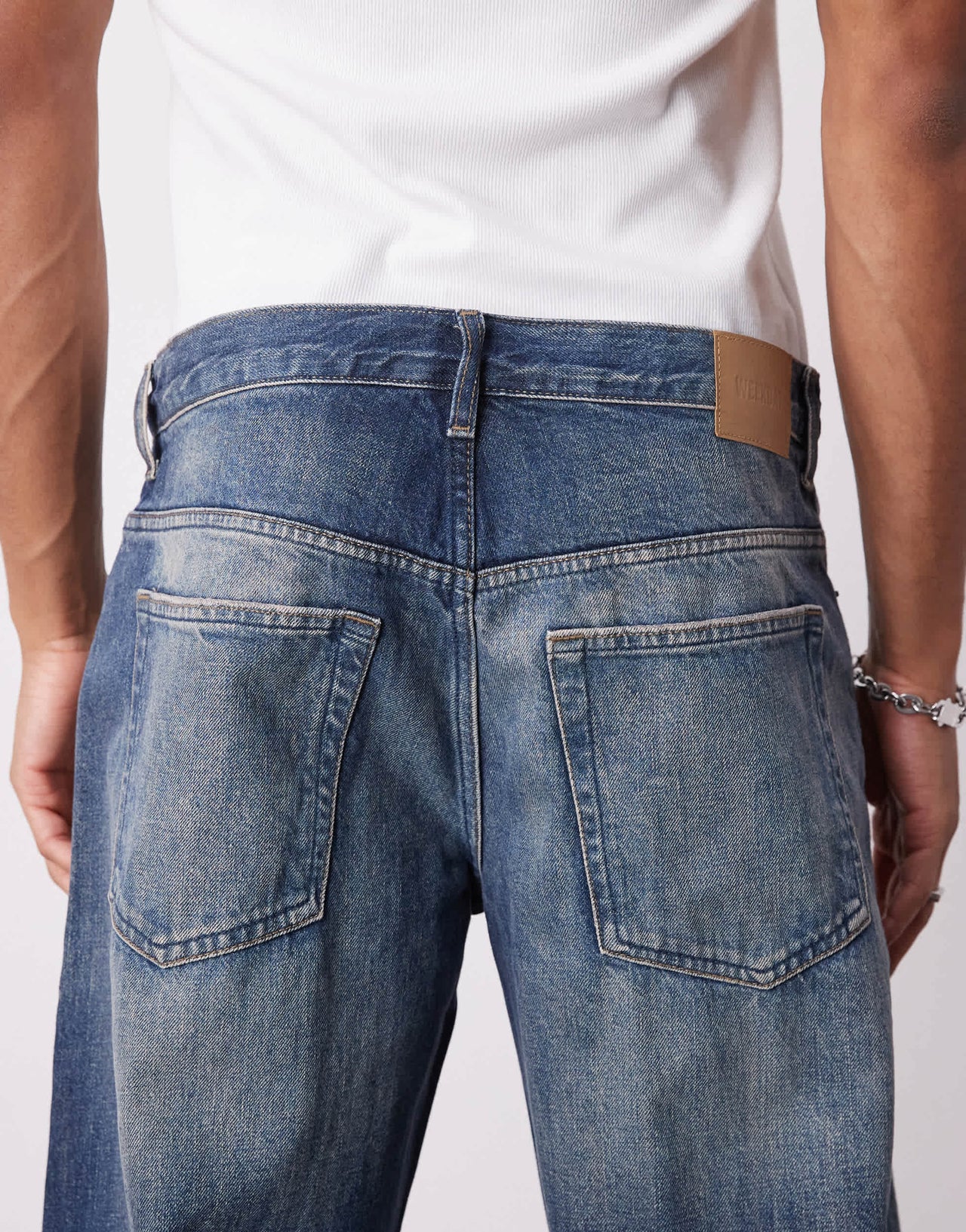 Weekday low waist loose fit barrel leg jeans with dart shaping in washed blue