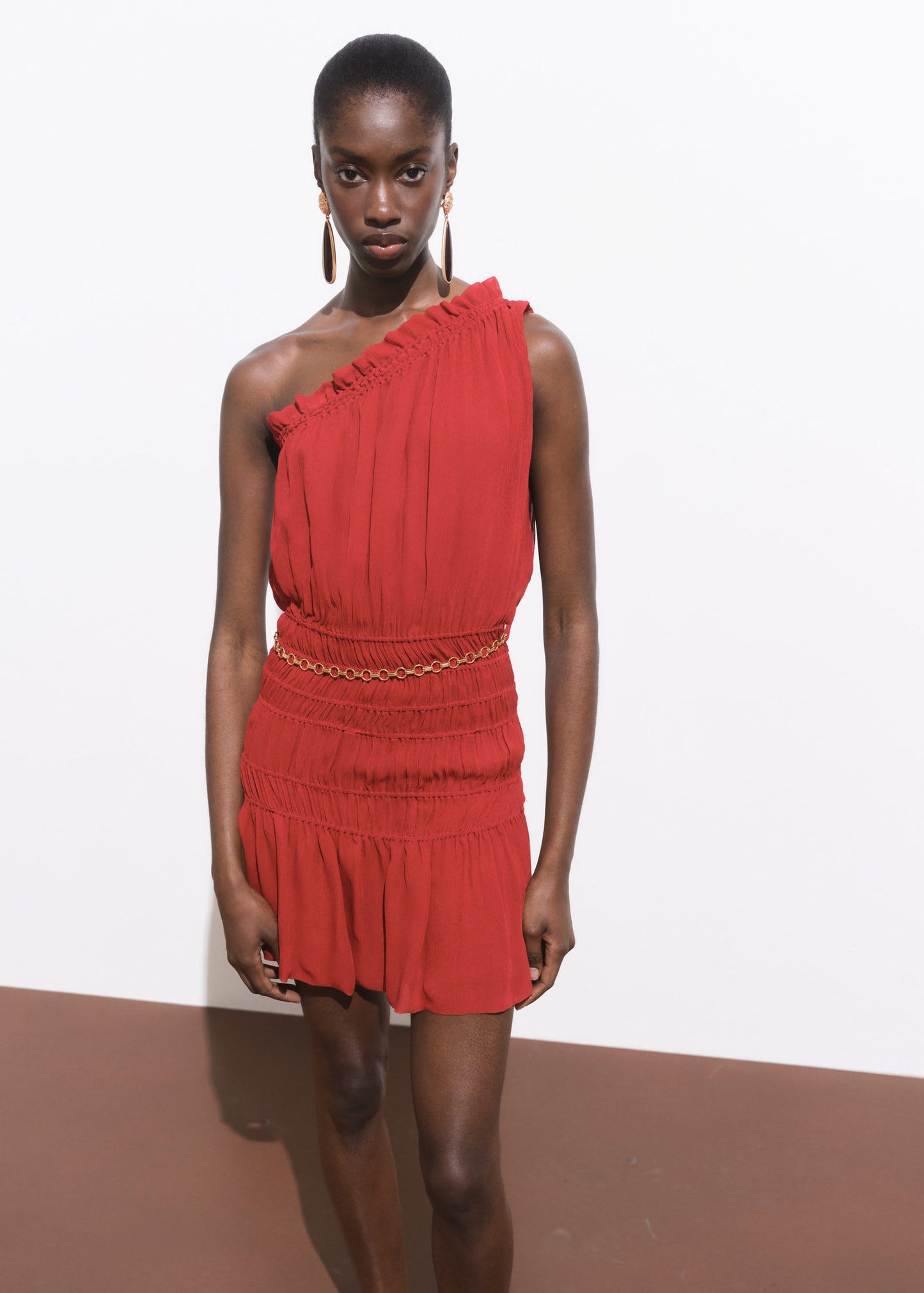 Mango featuring Kaia Gerber ruched one shoulder dress with gold chain belt in dark red