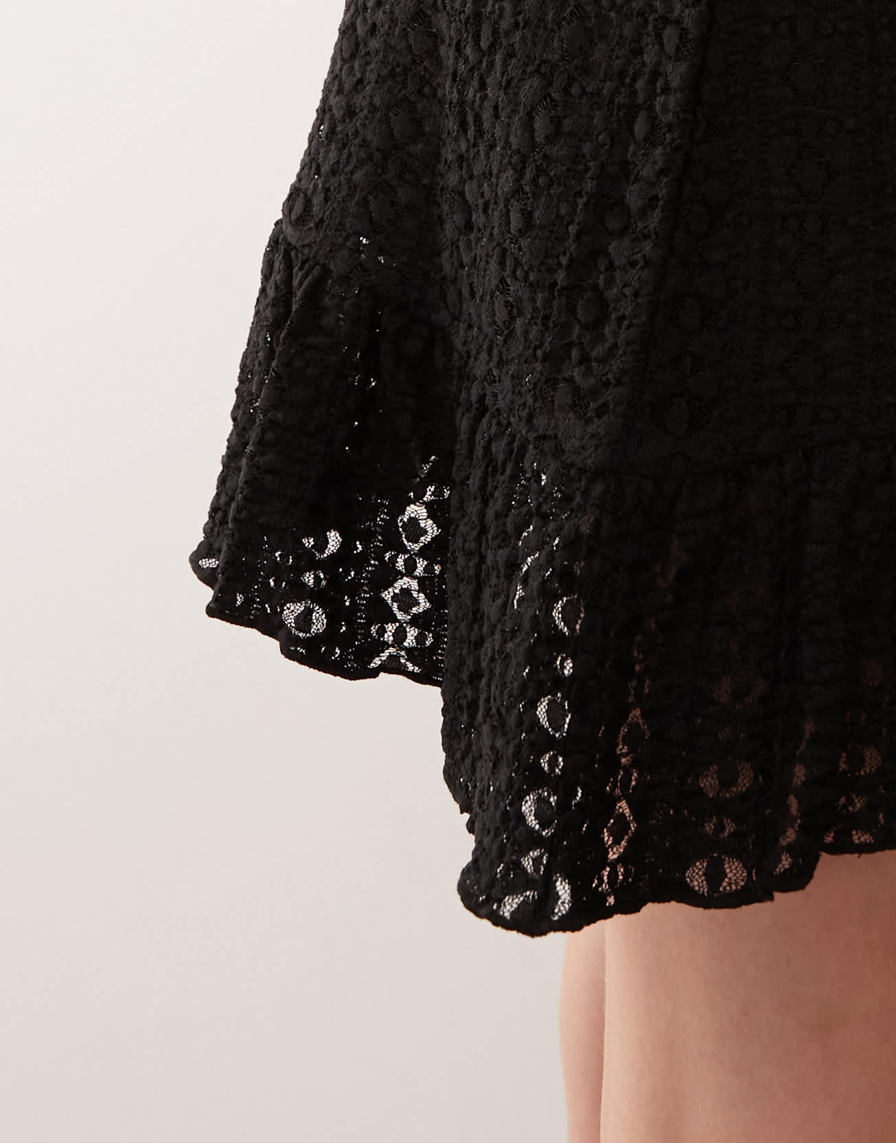 COLLUSION lace asymmetric mini skirt in black