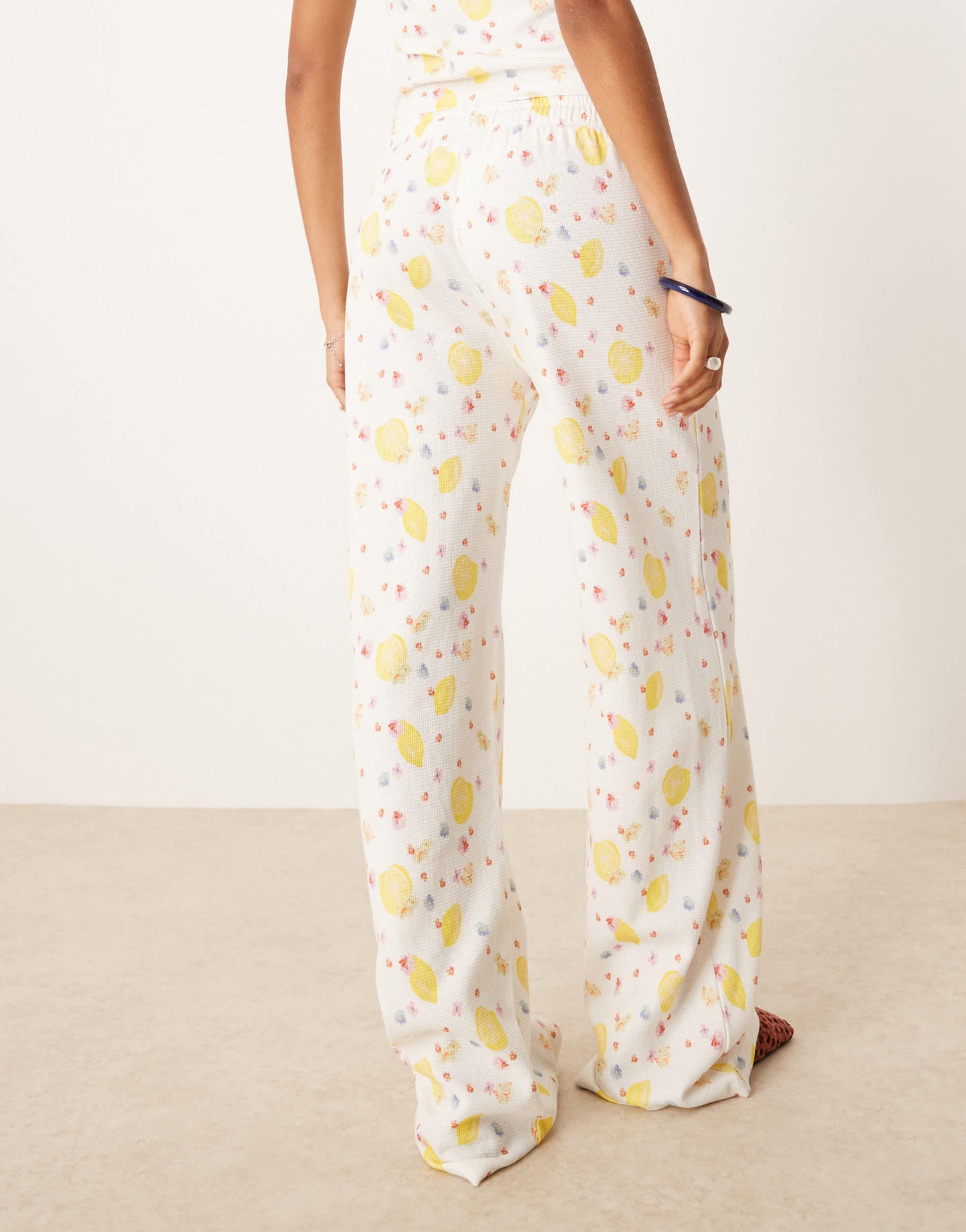 ASOS DESIGN waffle wide leg trouser co-ord in lemon ditsy print