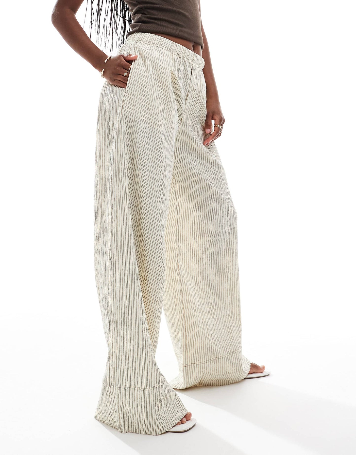 Bershka wide leg seersucker trousers in sand stripe