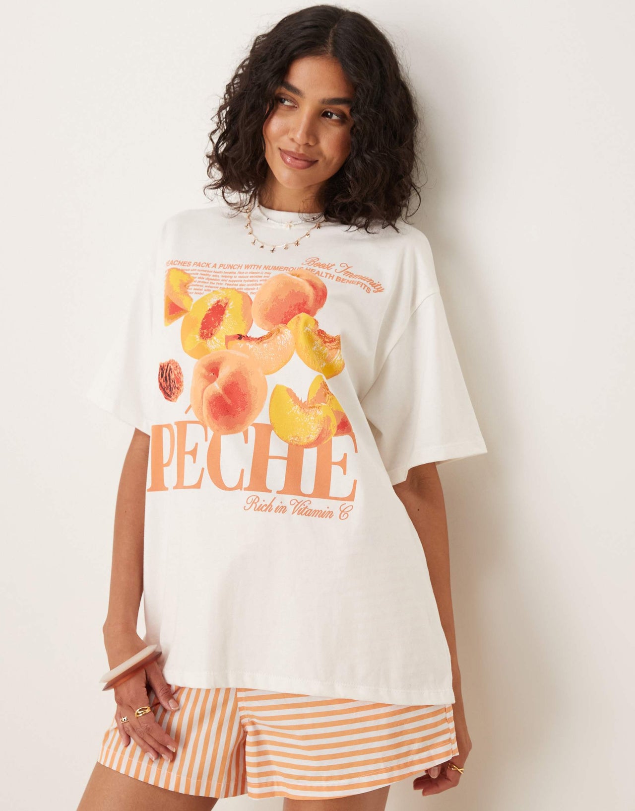 ASOS DESIGN  oversized t-shirt with peach graphic in white