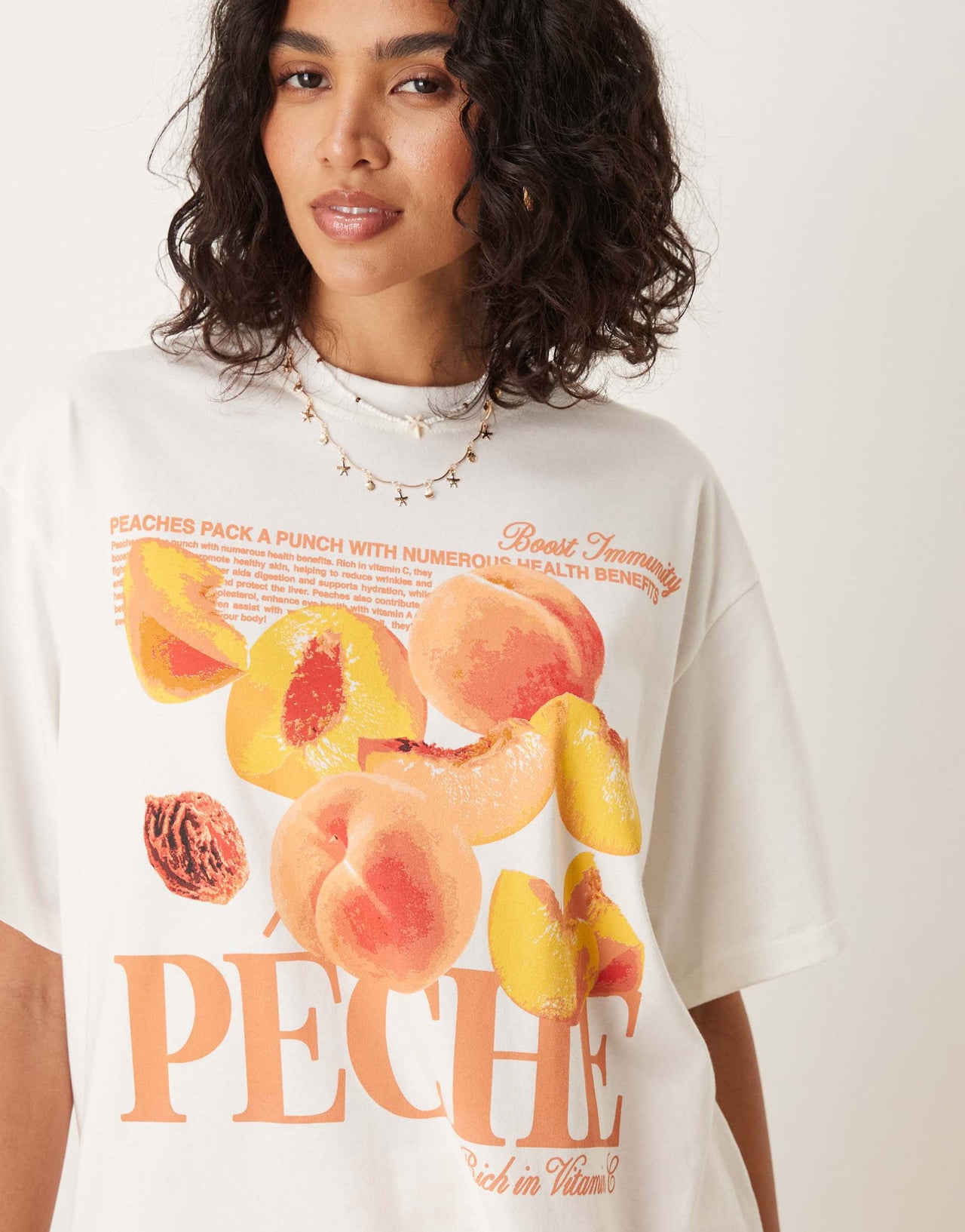 ASOS DESIGN  oversized t-shirt with peach graphic in white