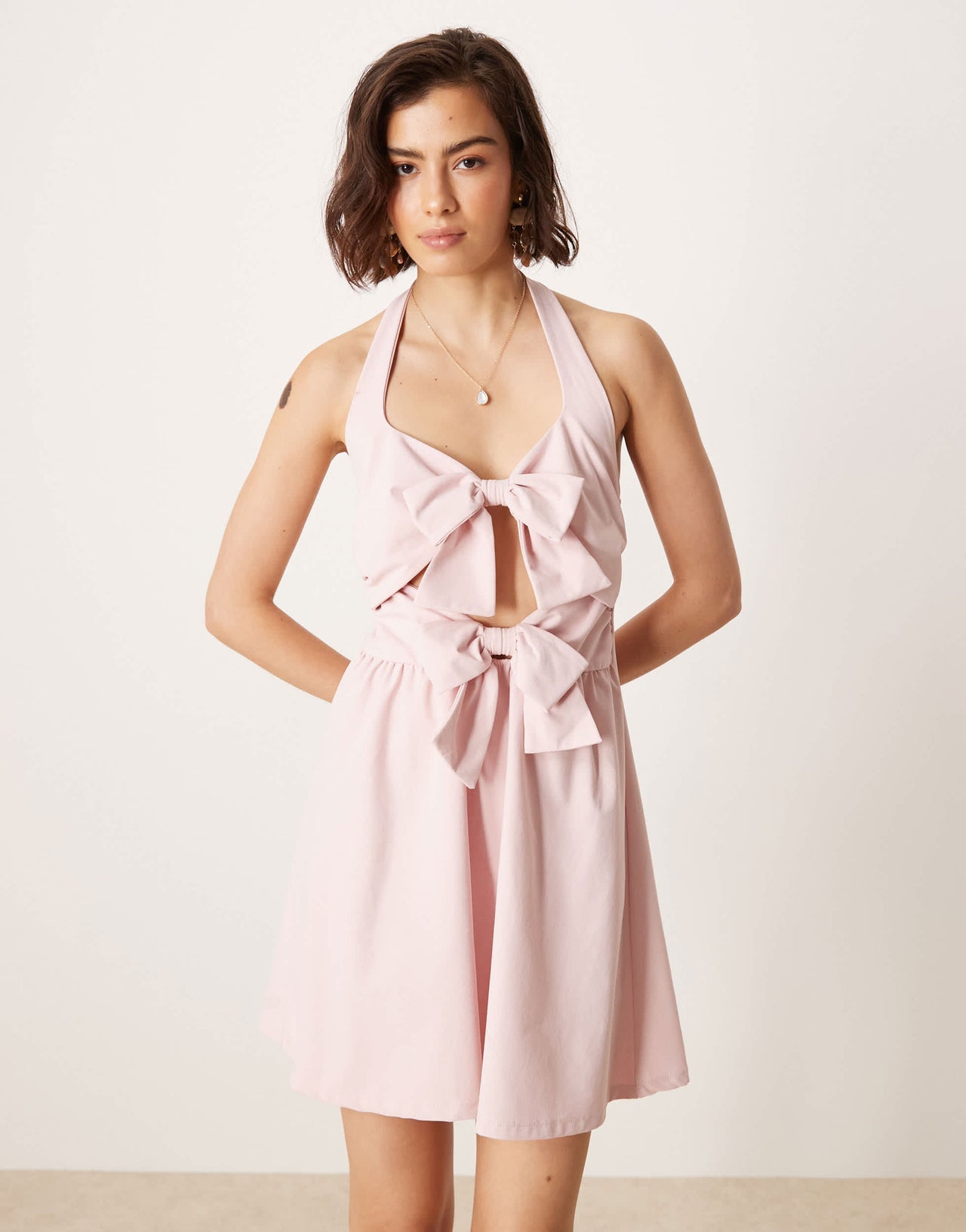 ASOS DESIGN double bow front halter mini dress in baby pink