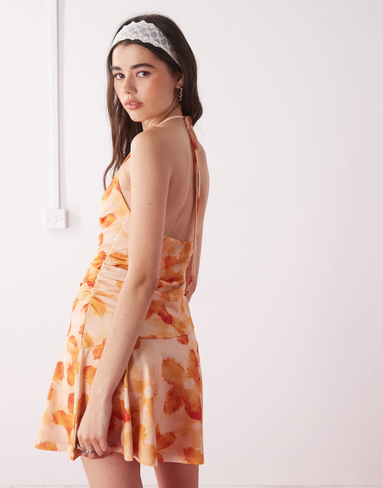 Reclaimed Vintage halter neck mini dress in tropical print