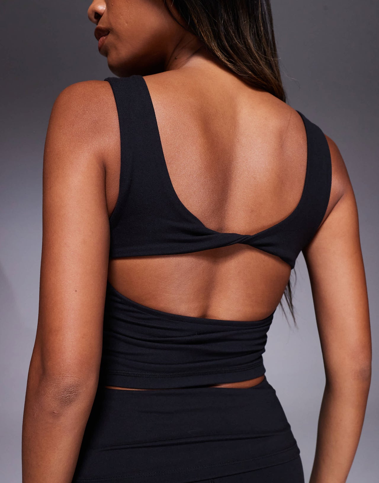 4505 Yoga soft touch twist back vest with inner bra in black