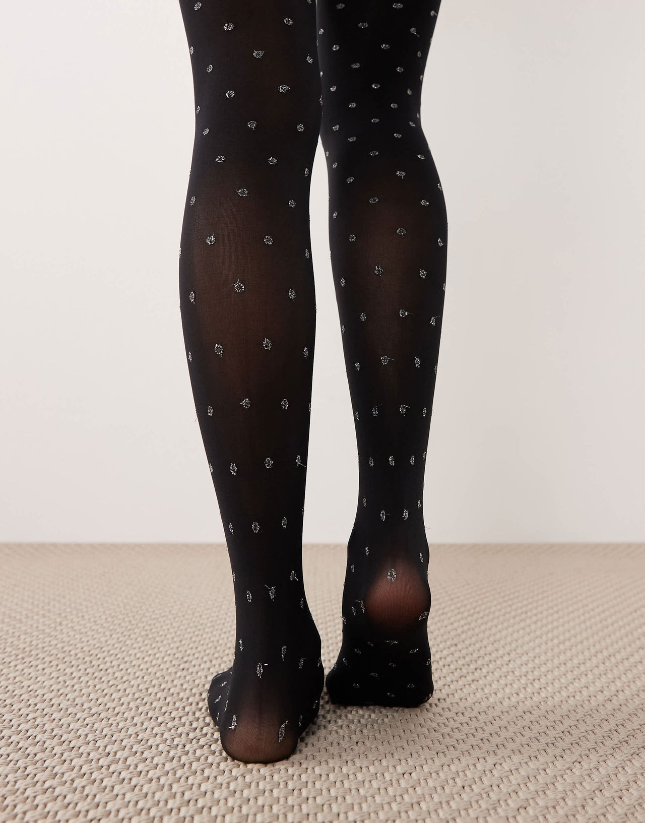 ASOS DESIGN tights with metallic glitter dots in black