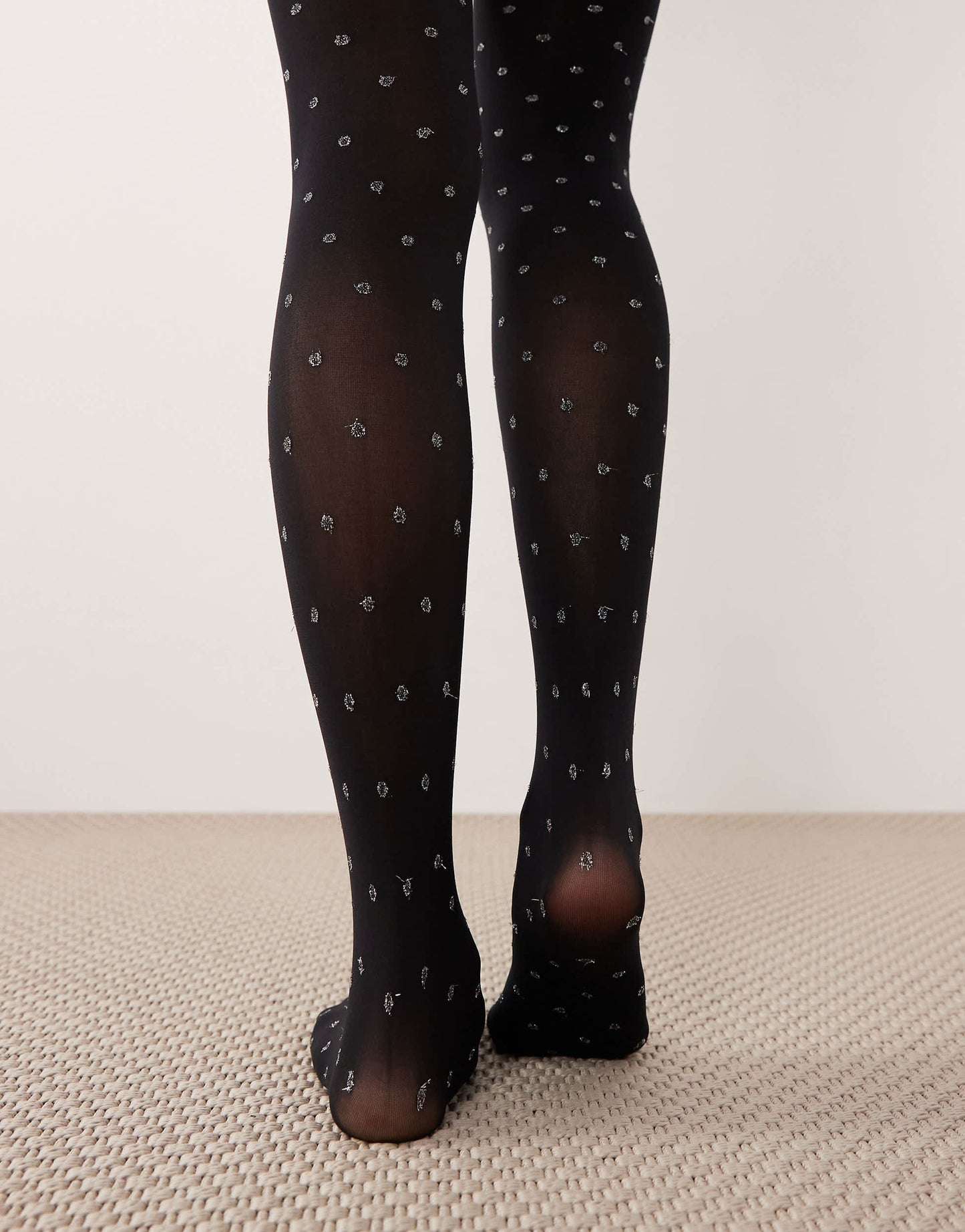 ASOS DESIGN tights with metallic glitter dots in black