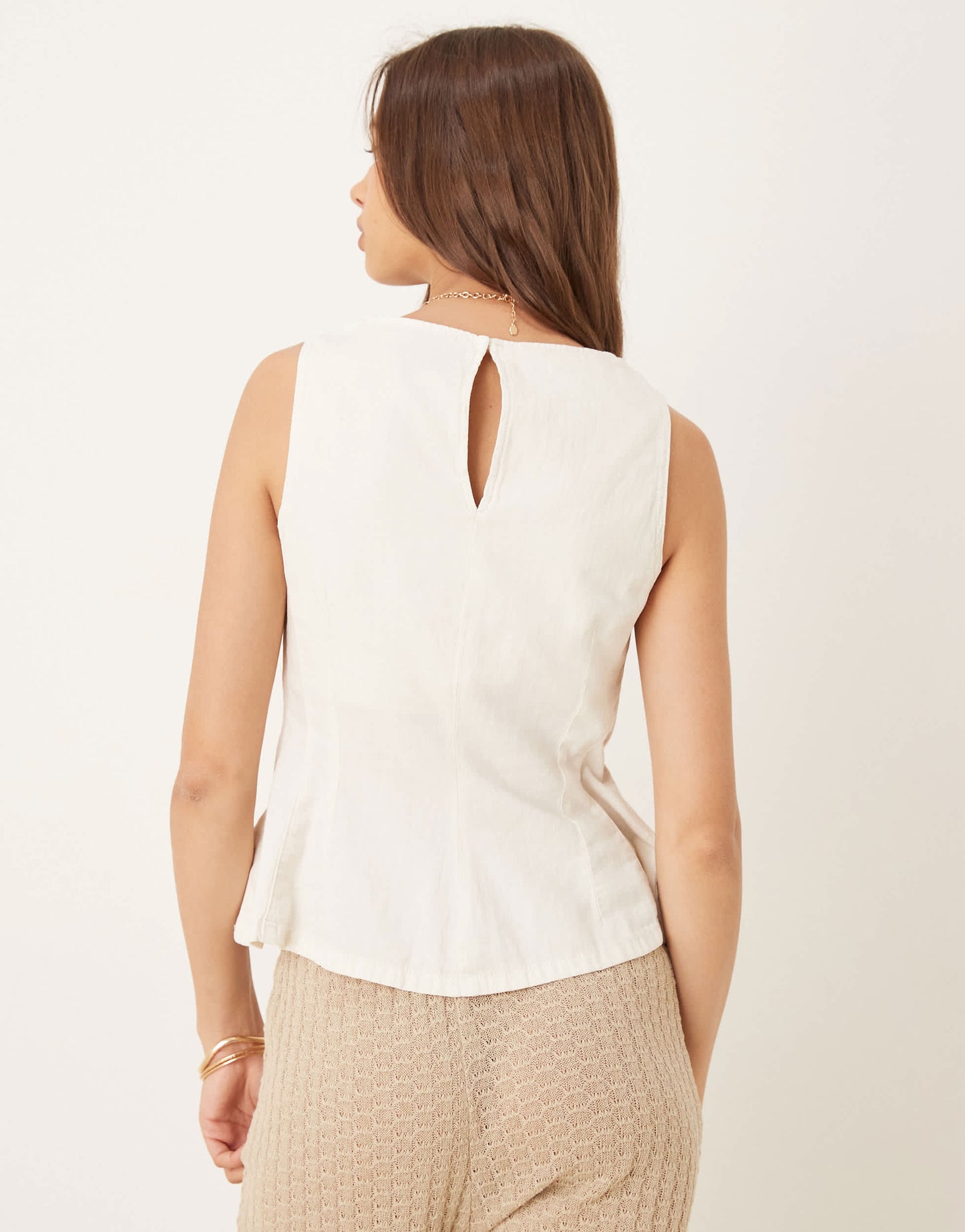 Mango sleeveless peplum hem top in cream