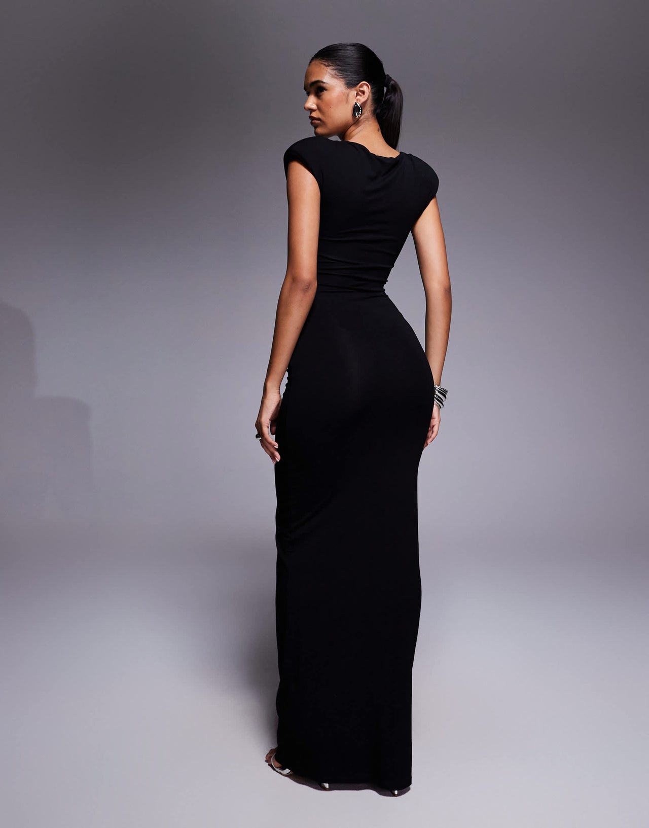 ASOS DESIGN sleeveless  low plunge twist front cut out maxi dress in black