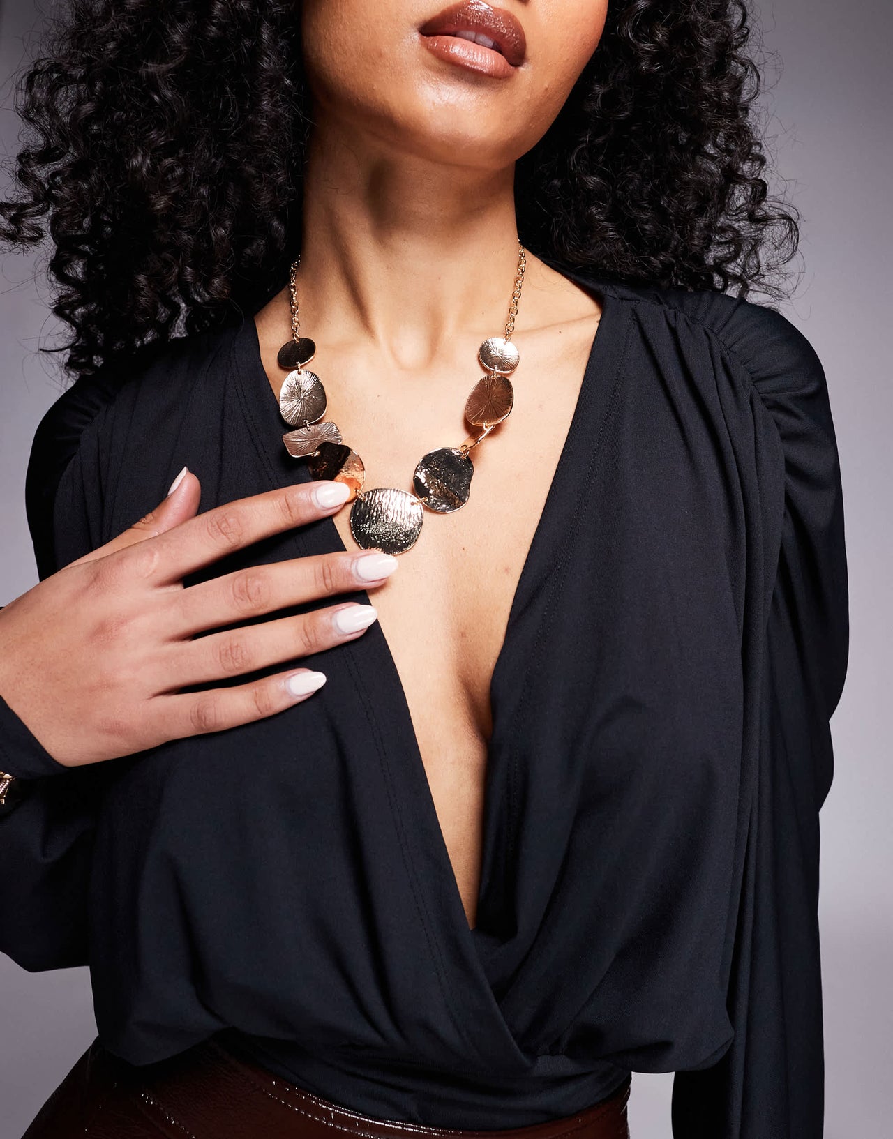ASOS DESIGN wrap front plunge batwing top with shoulder pad detail in black