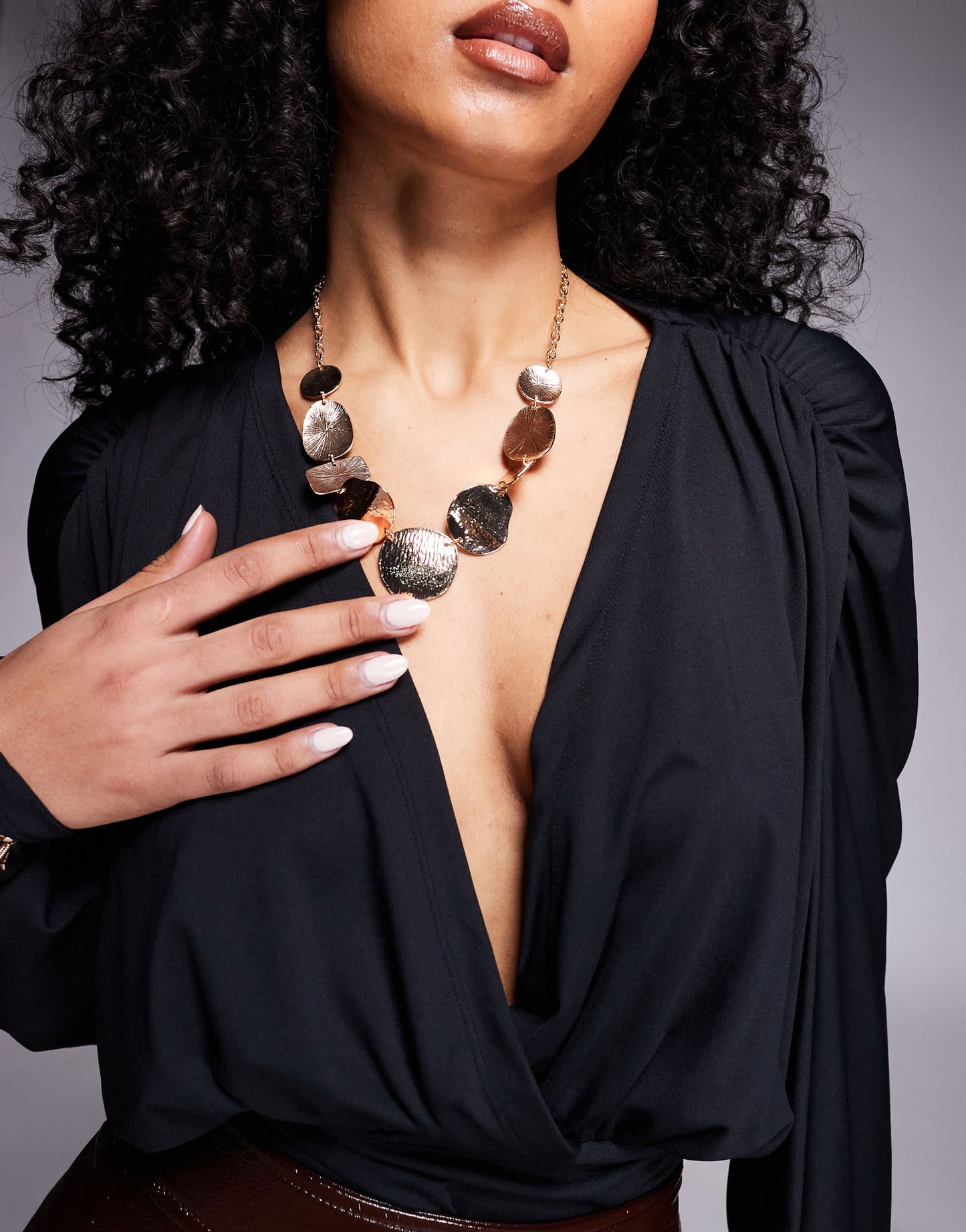 ASOS DESIGN wrap front plunge batwing top with shoulder pad detail in black