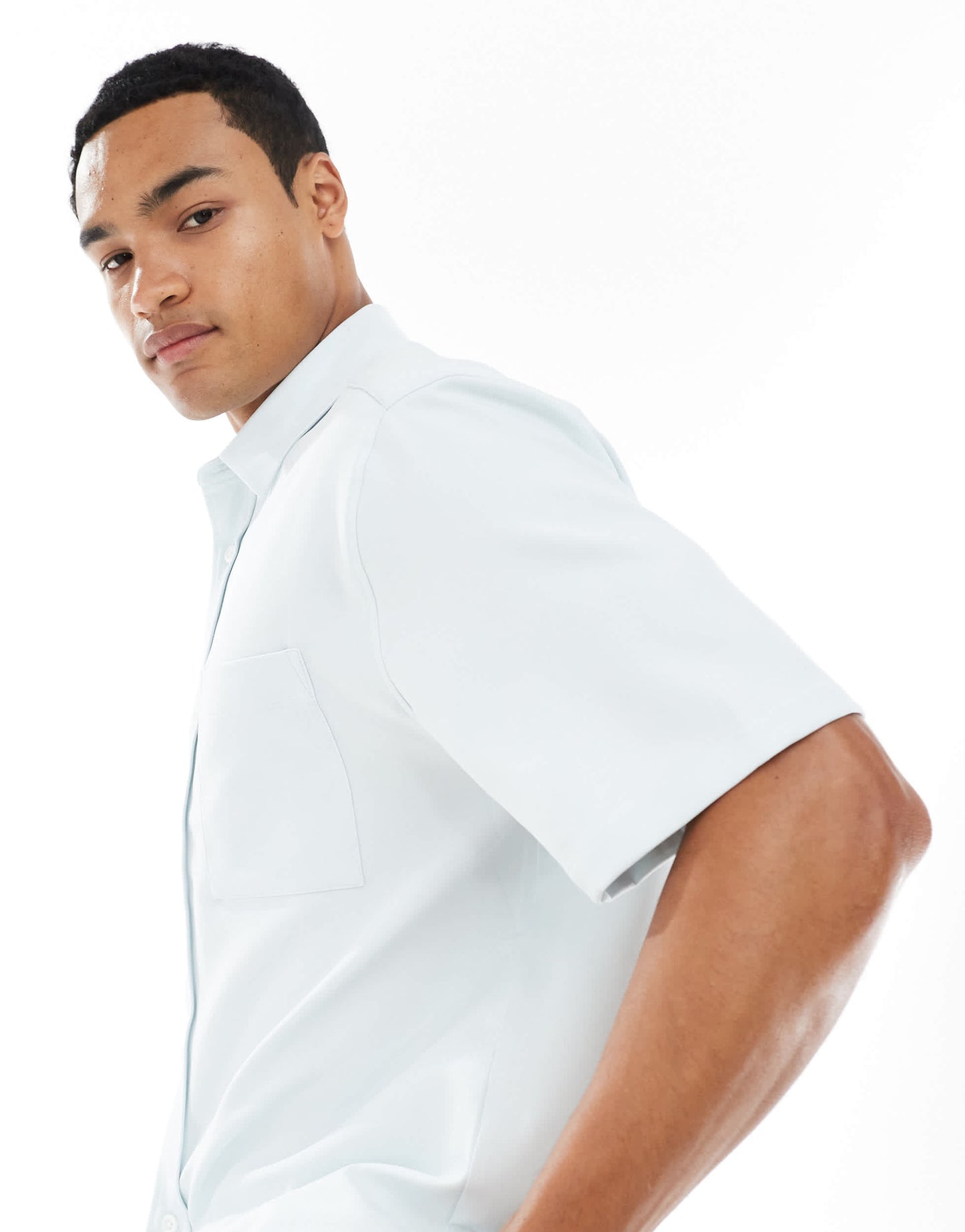 ASOS DESIGN relaxed shirt with patch pockets in blue
