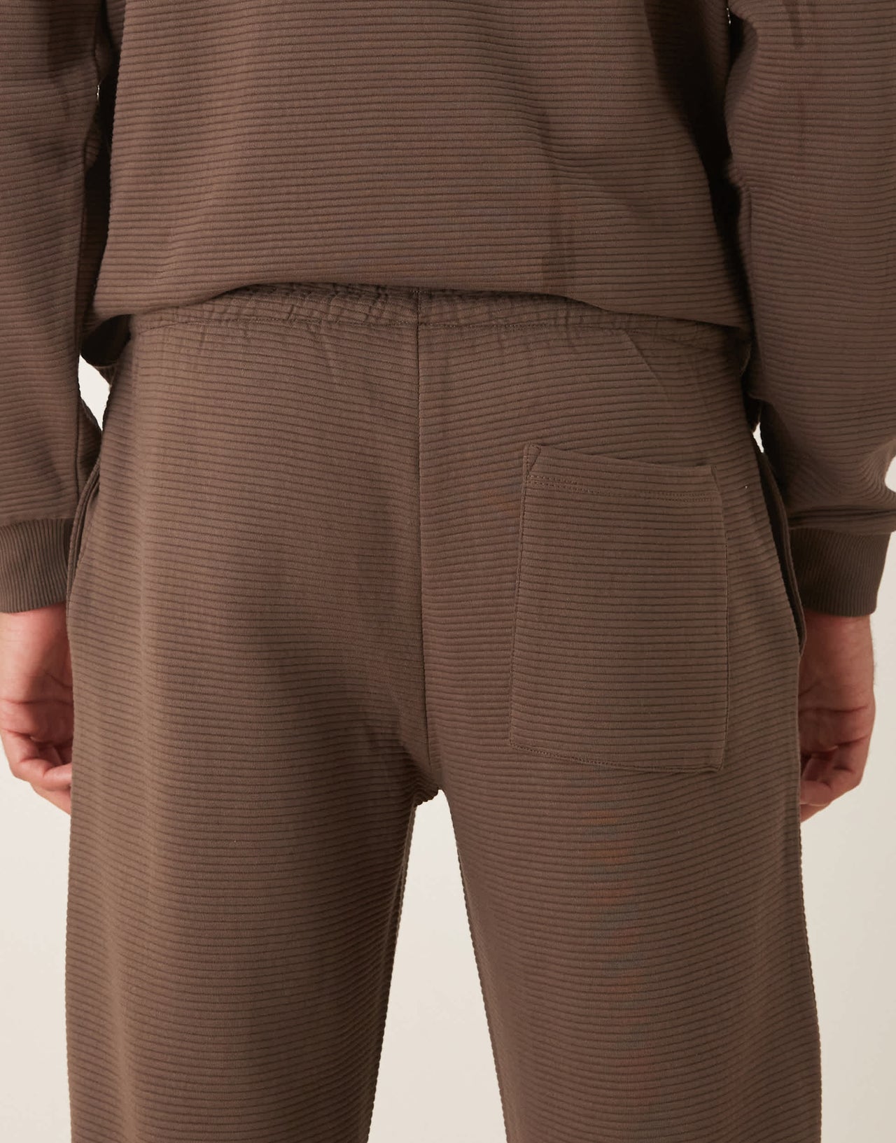 ASOS DESIGN co-ord heavyweight straight jogger in ribbed scuba-style fabric in brown - BROWN