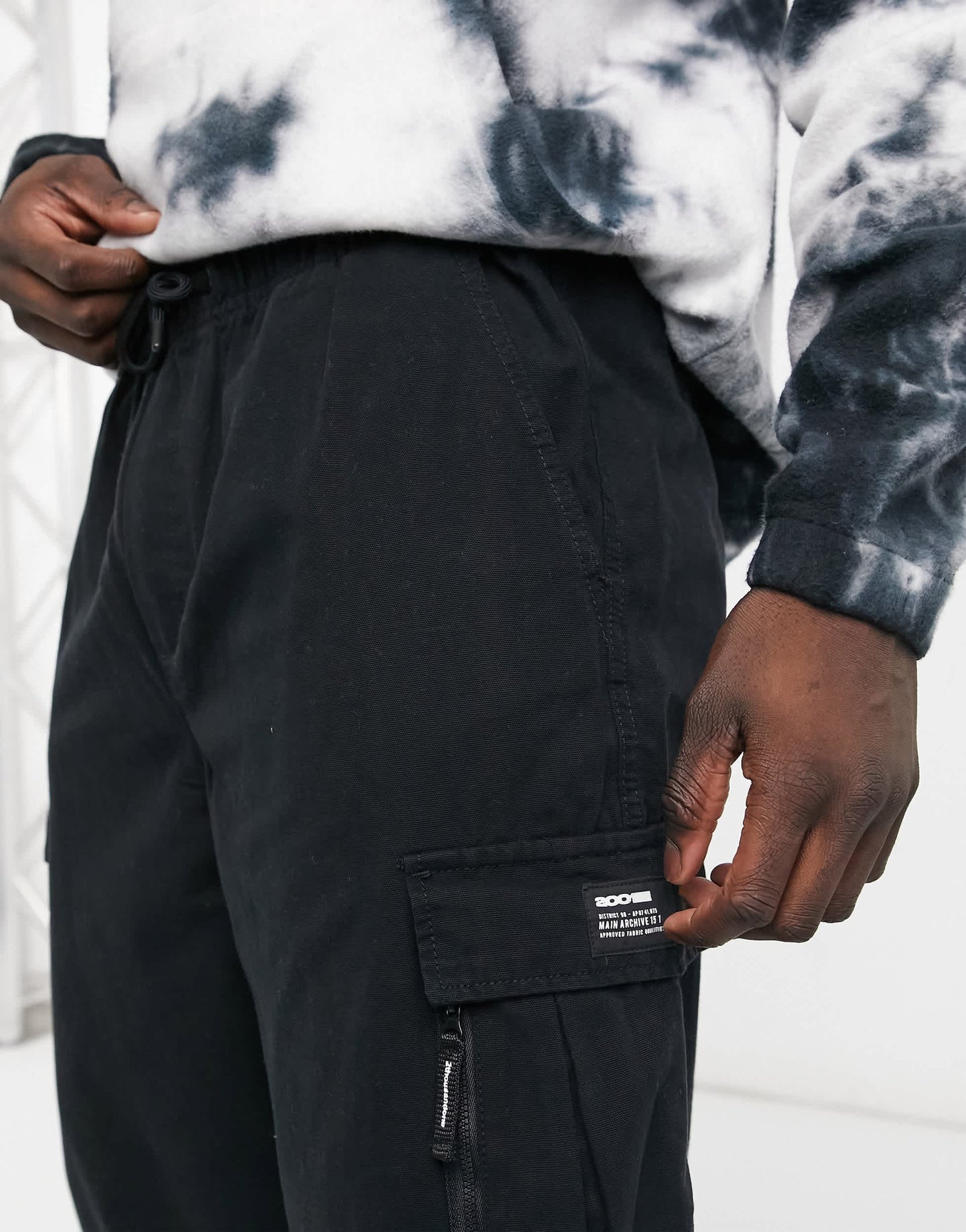 Bershka cuffed cargo trousers in black