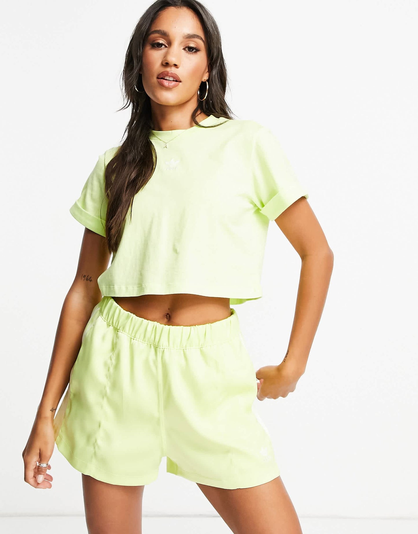 adidas Originals adicolor three stripe satin look shorts in yellow