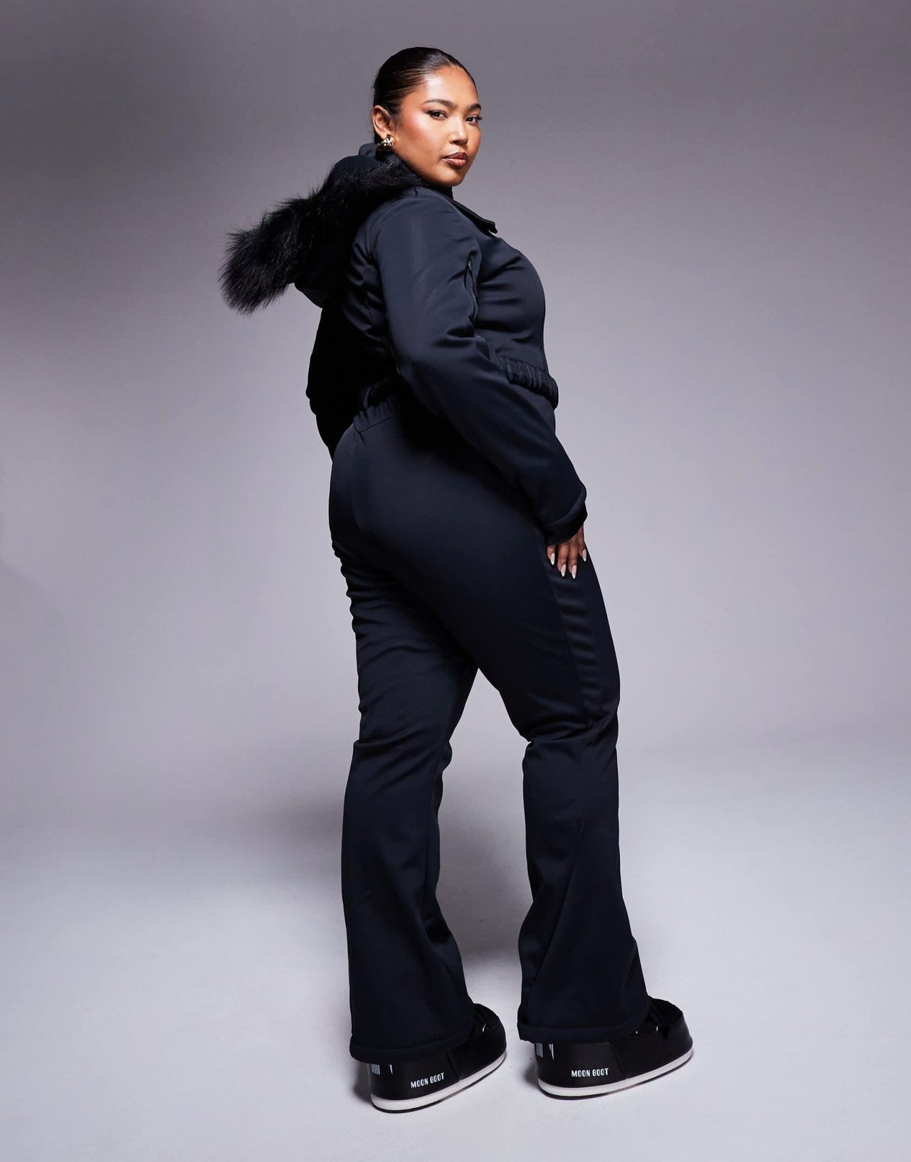 4505 Curve Icon belted ski suit with slim kick leg and faux fur hood in black - ASOS Sample Sale