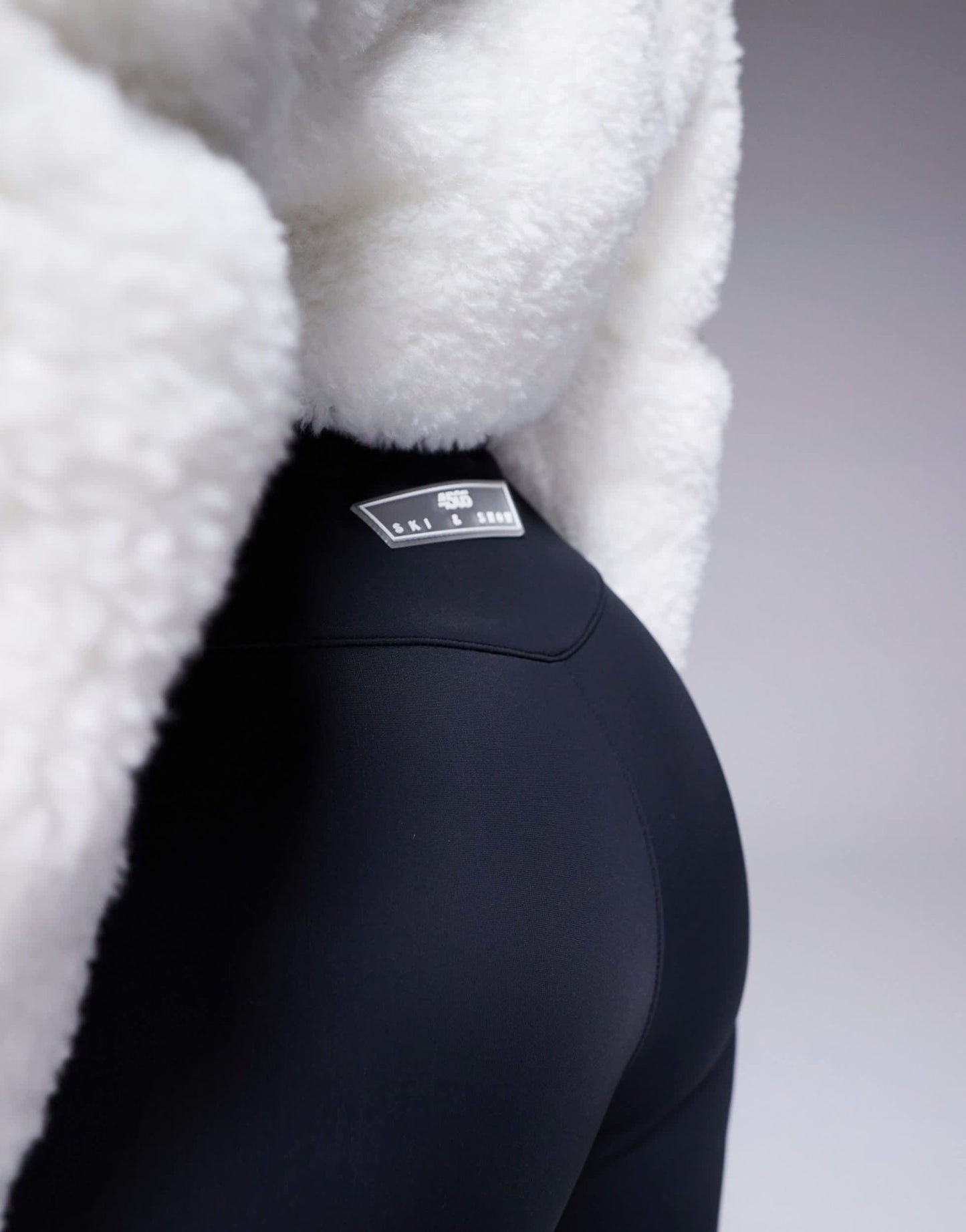 4505 Ski suit with faux fur panels and skinny leg in black and white - ASOS Sample Sale