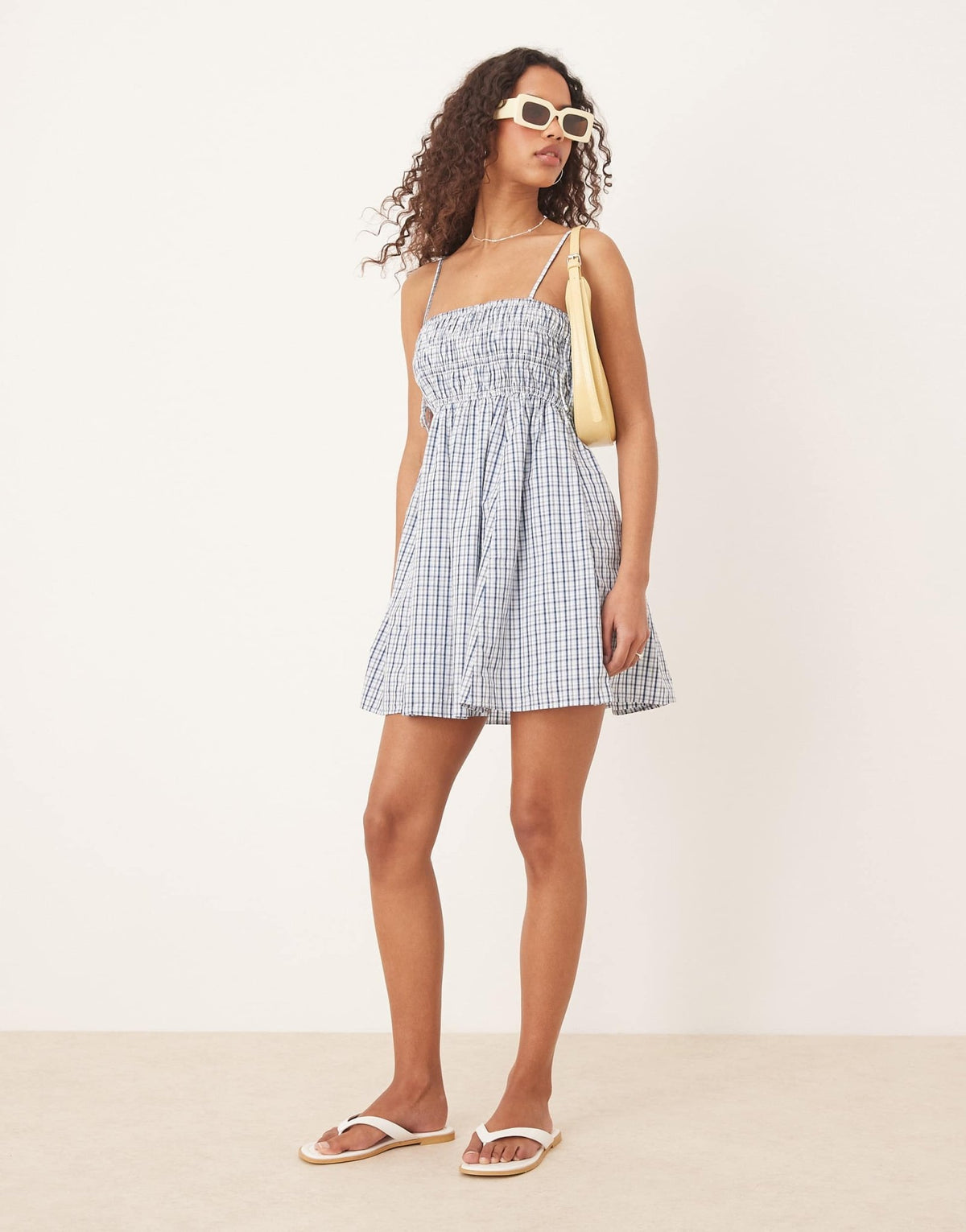 Abercrombie & Fitch babydoll smocked mini dress in blue gingham - ASOS Sample Sale
