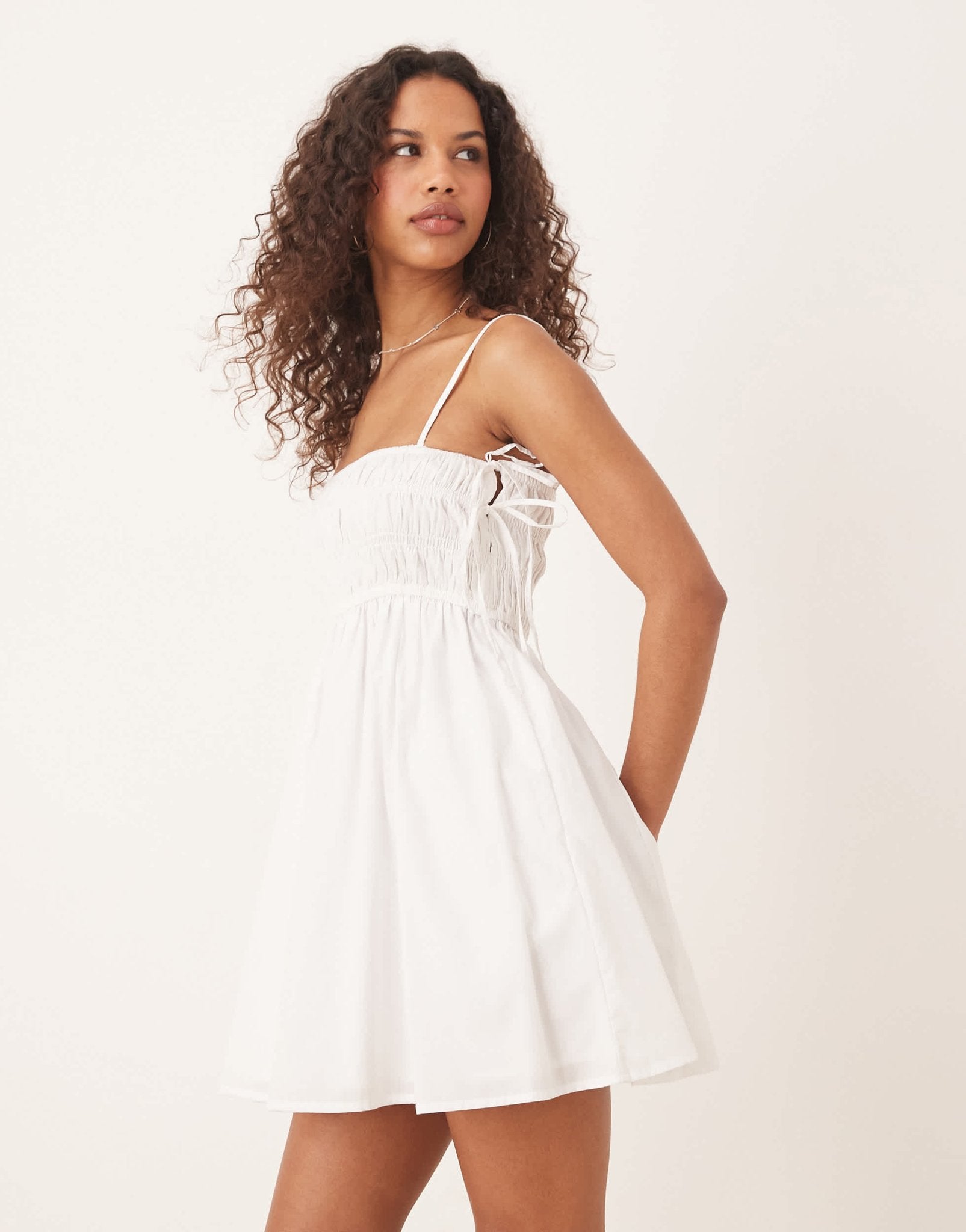Abercrombie & Fitch babydoll smocked mini dress in white - ASOS Sample Sale