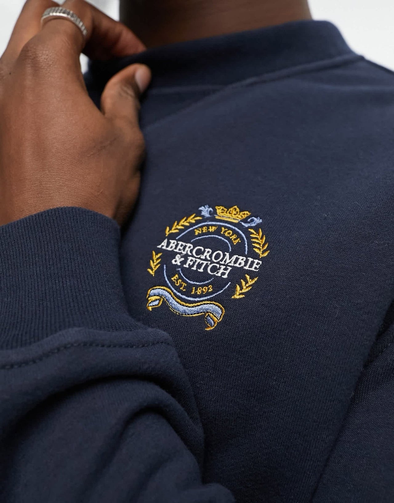 Abercrombie & Fitch crest badge logo french terry sweatshirt in navy - ASOS Sample Sale