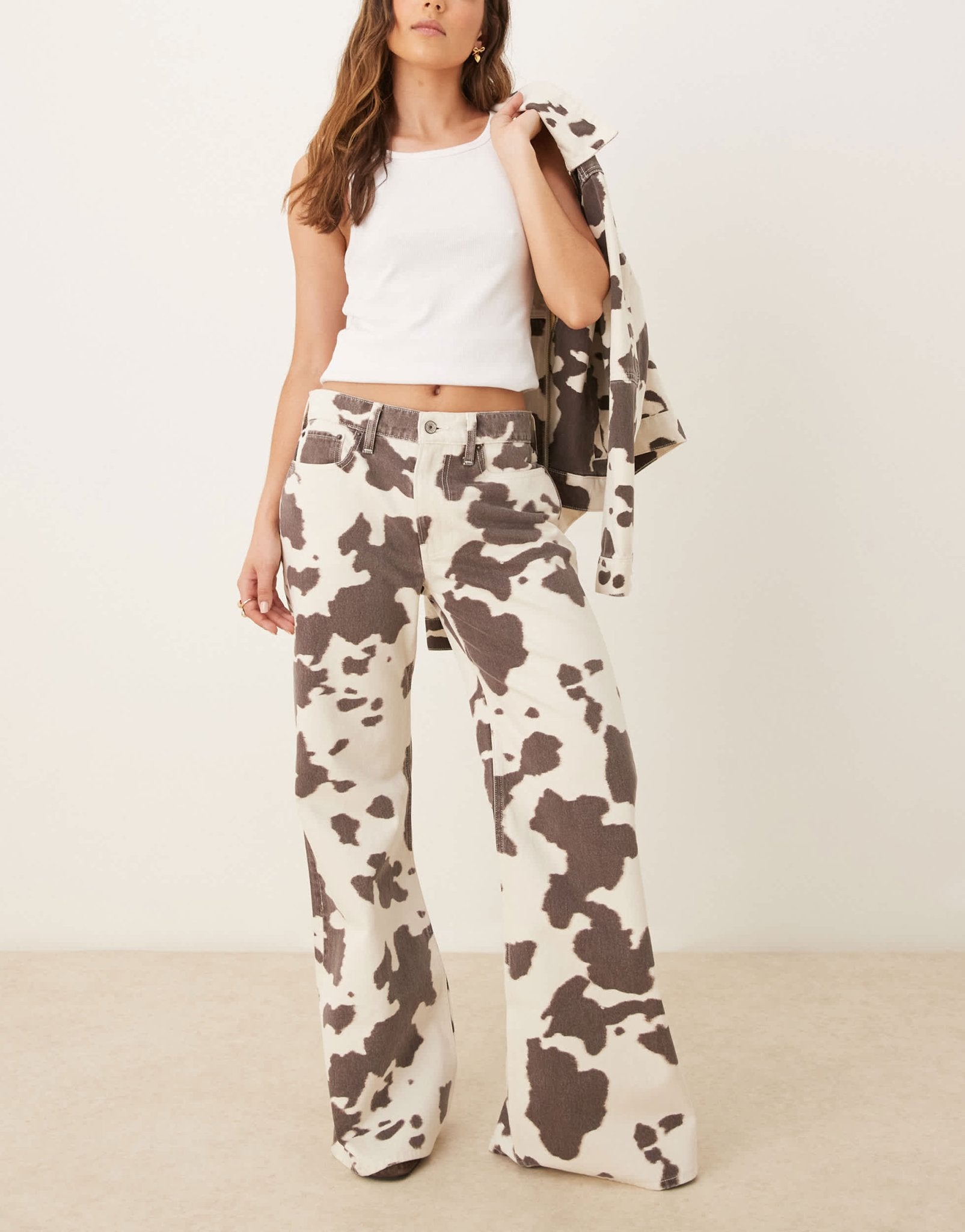 Abercrombie & Fitch mid rise baggy bootcut jean in multi cow print - ASOS Sample Sale