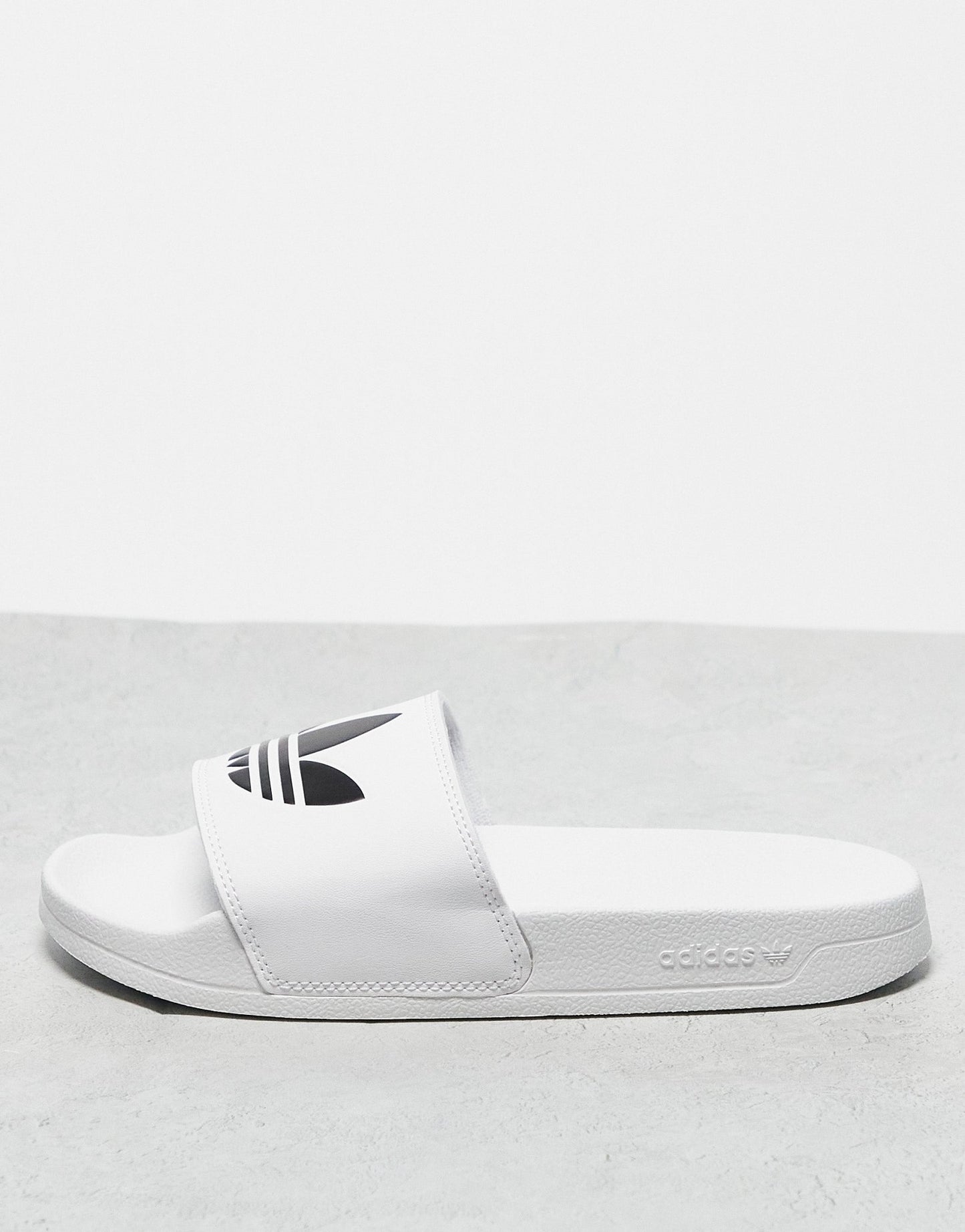 adidas Originals adilette Lite sliders in white - ASOS Sample Sale