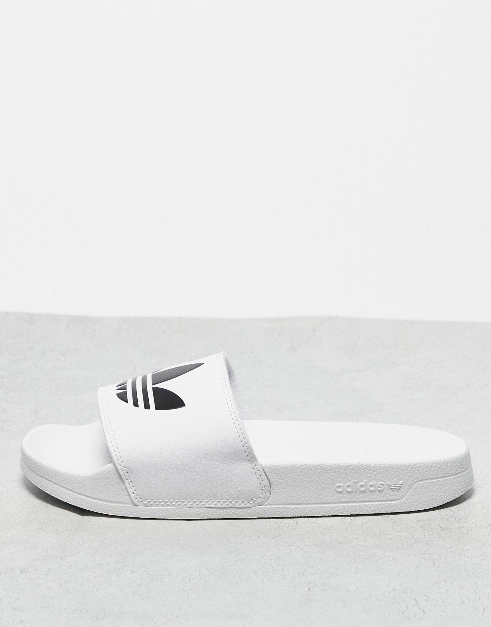 adidas Originals adilette Lite sliders in white - ASOS Sample Sale