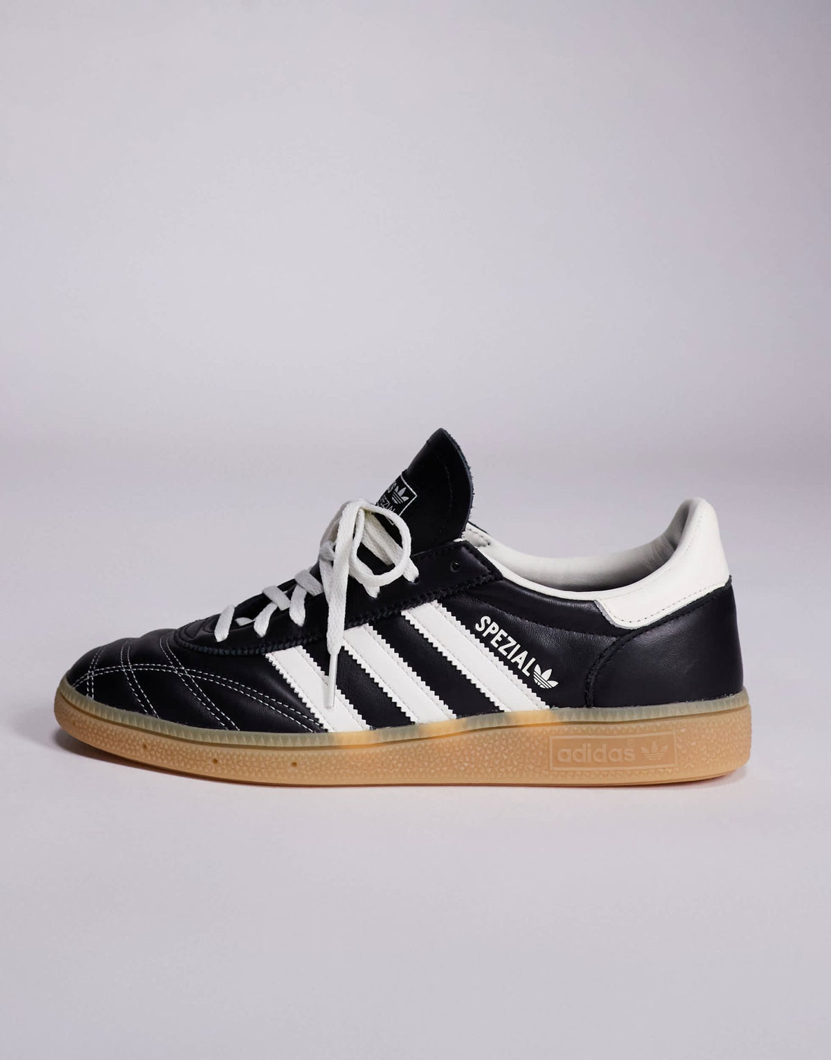 adidas Originals Handball Spezial trainers in black and white stitch with gum sole - ASOS Sample Sale