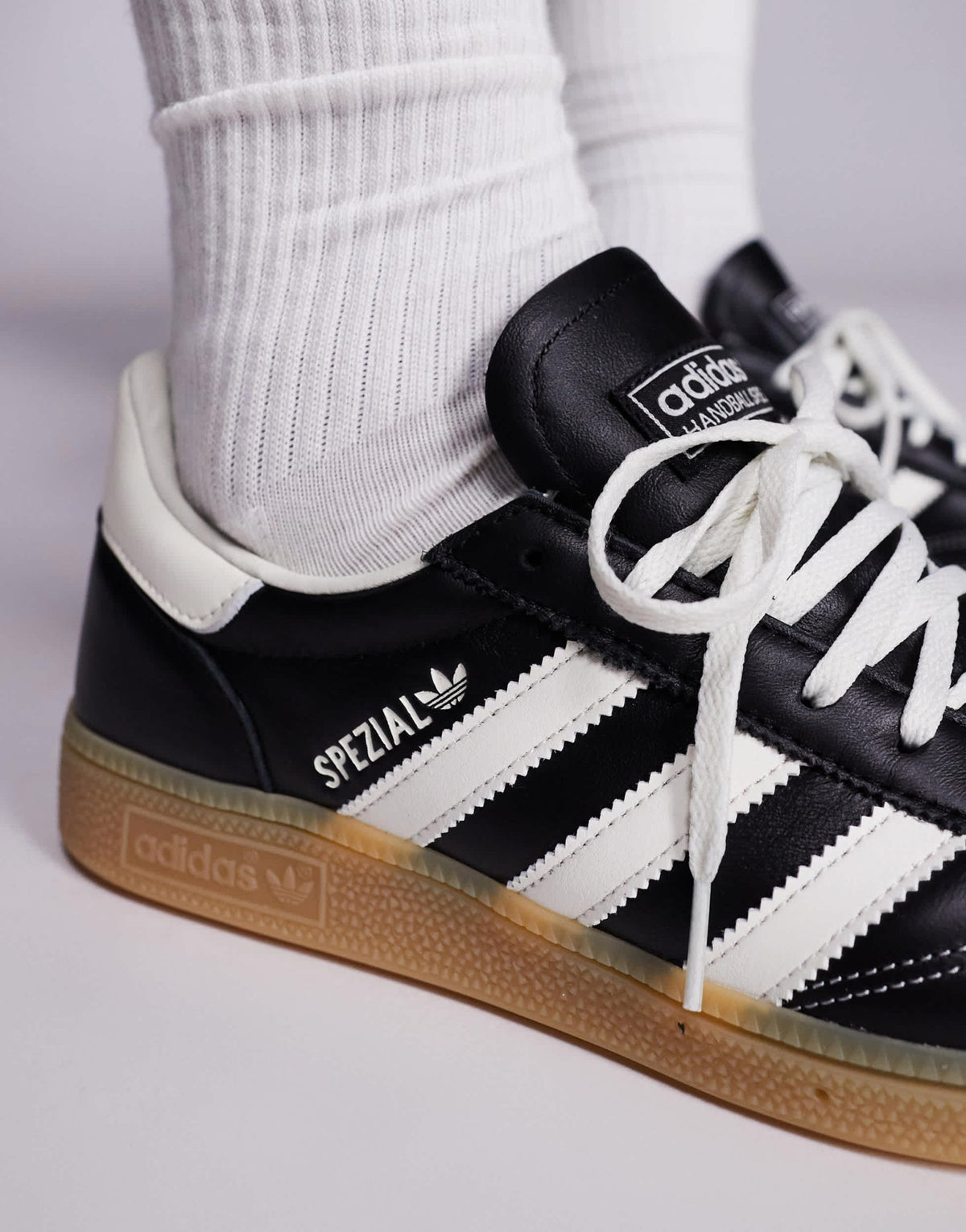 adidas Originals Handball Spezial trainers in black and white stitch with gum sole - ASOS Sample Sale