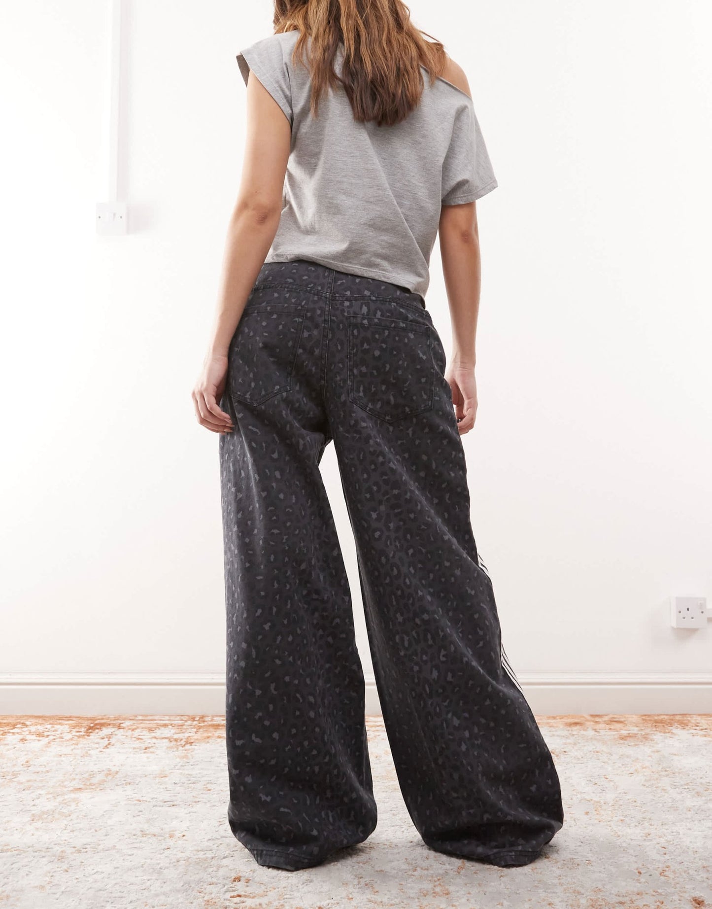 adidas Originals wide leg denim jeans in black leopard print - ASOS Sample Sale