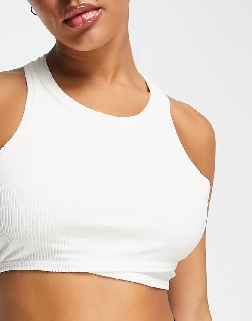 adidas Yoga Studio sleeveless cropped vest in white - ASOS Sample Sale
