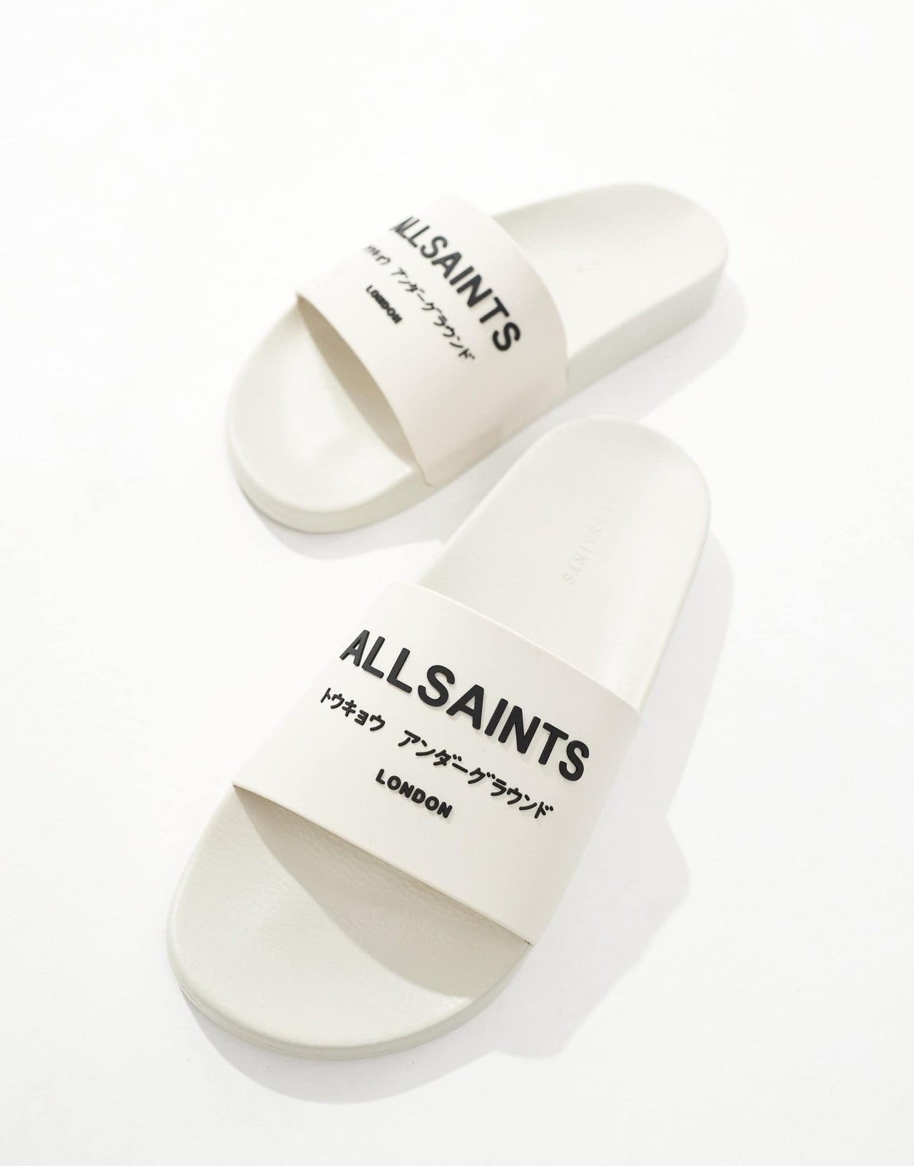 AllSaints Underground rubber sliders in white - ASOS Sample Sale