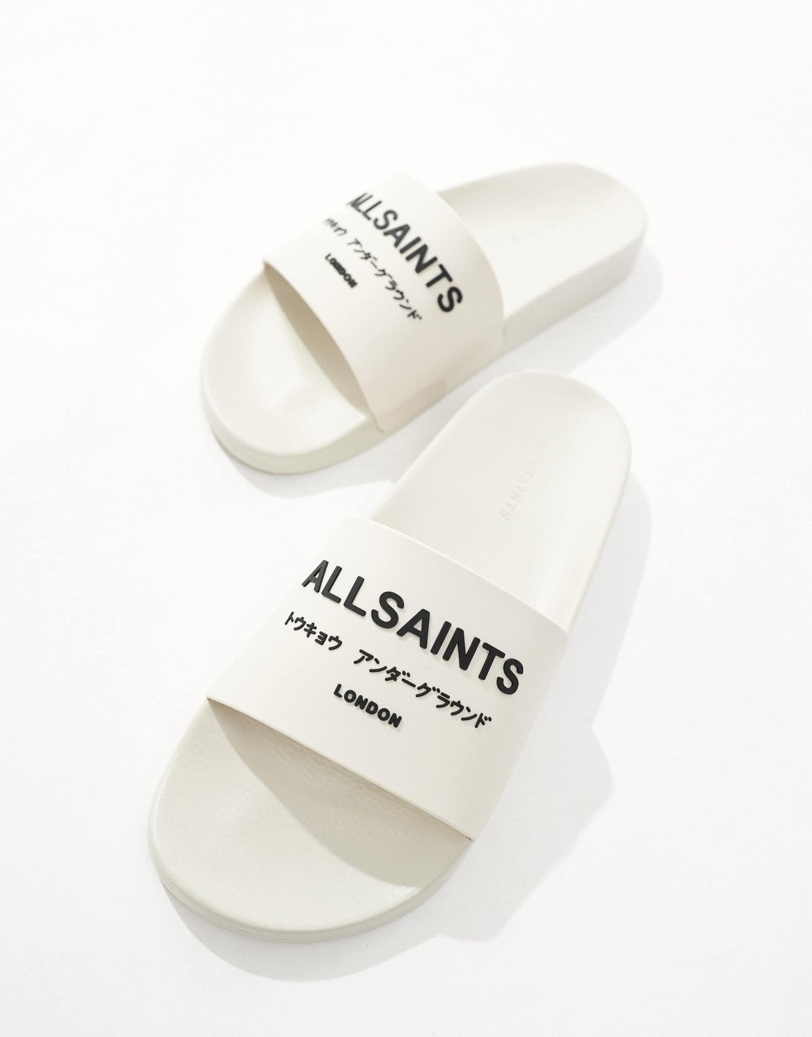 AllSaints Underground rubber sliders in white - ASOS Sample Sale
