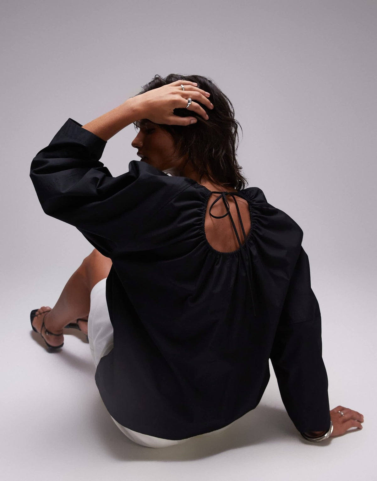 ARKET blouse with sculptural sleeves and gathered back detail in black - ASOS Sample Sale