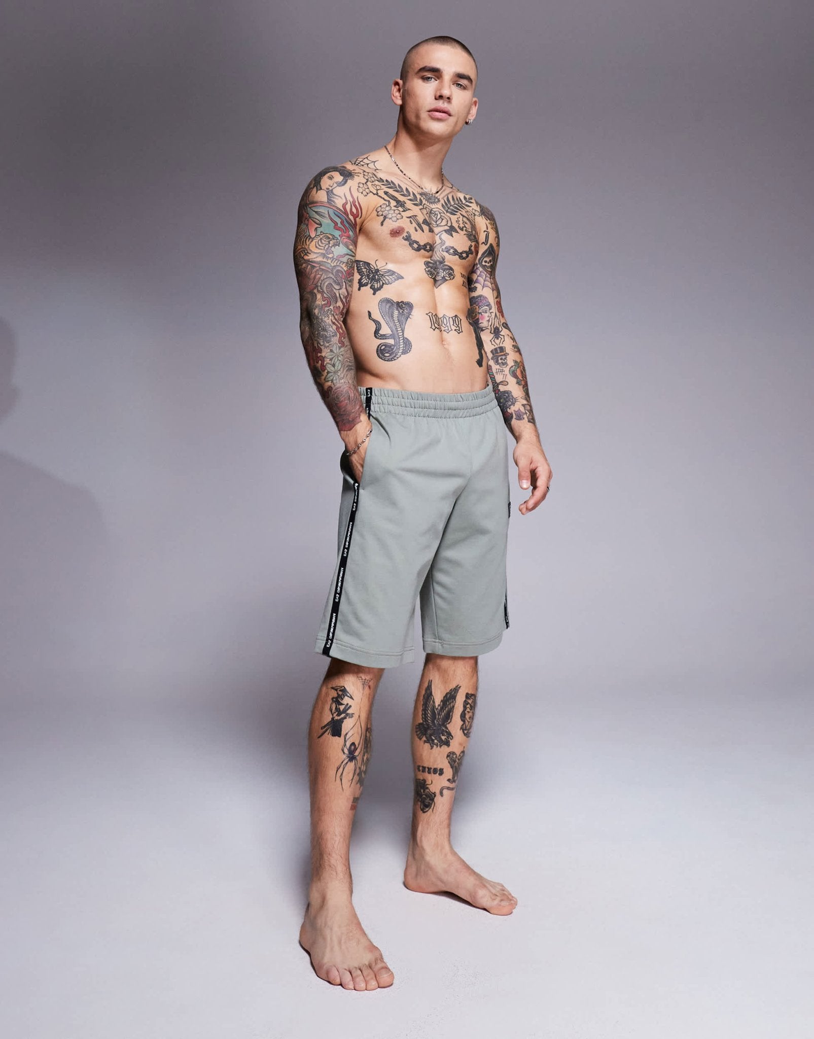 Armani EA7 cuffed sweat shorts with logo tape detail in sage green - ASOS Sample Sale