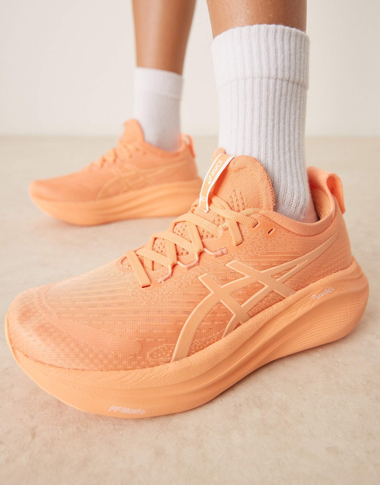 Asics Gel-Nimbus 27 lite-Show running trainers in orange - ASOS Sample Sale