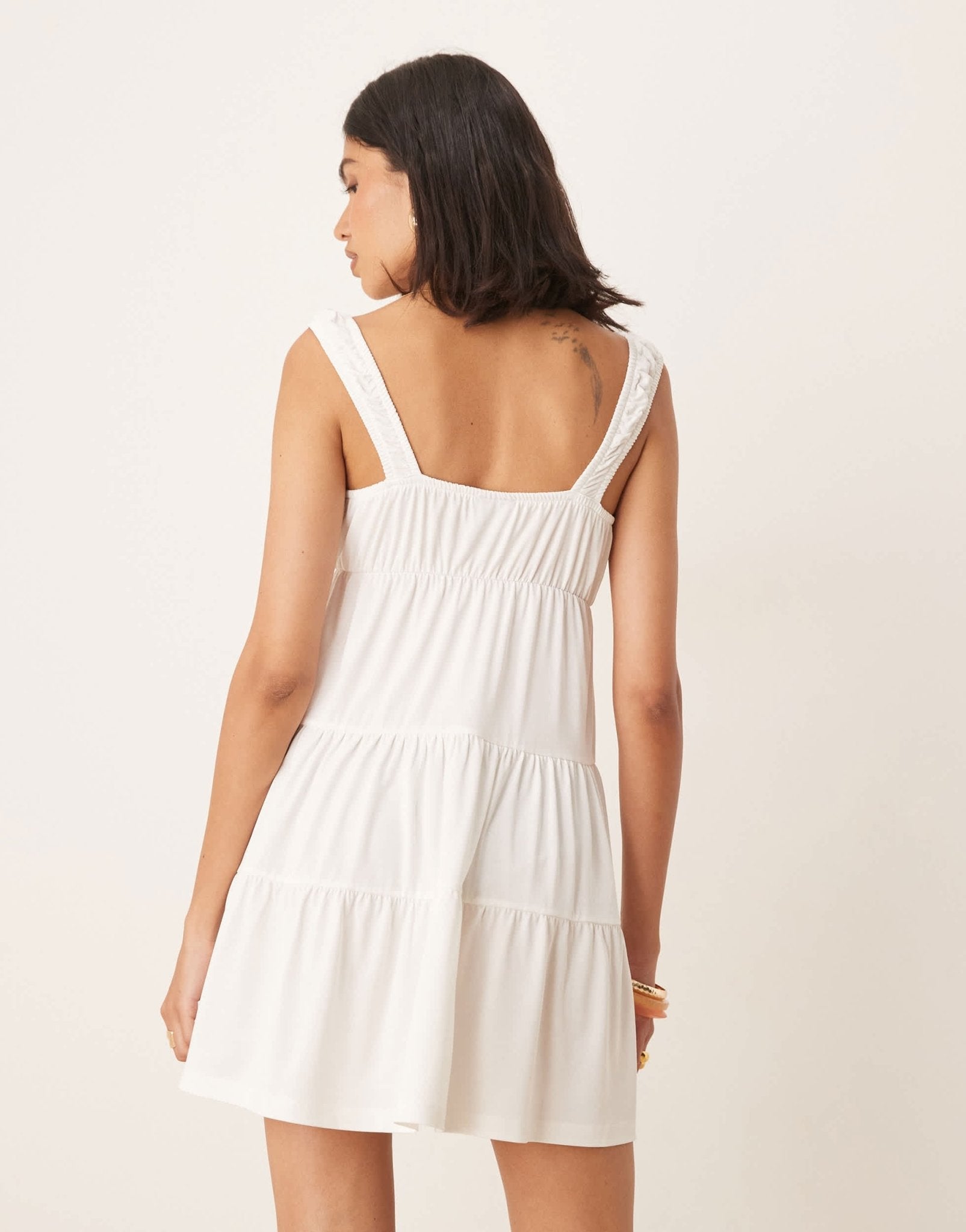 ASOS DESIGN babydoll swing tiered mini dress in ivory - ASOS Sample Sale