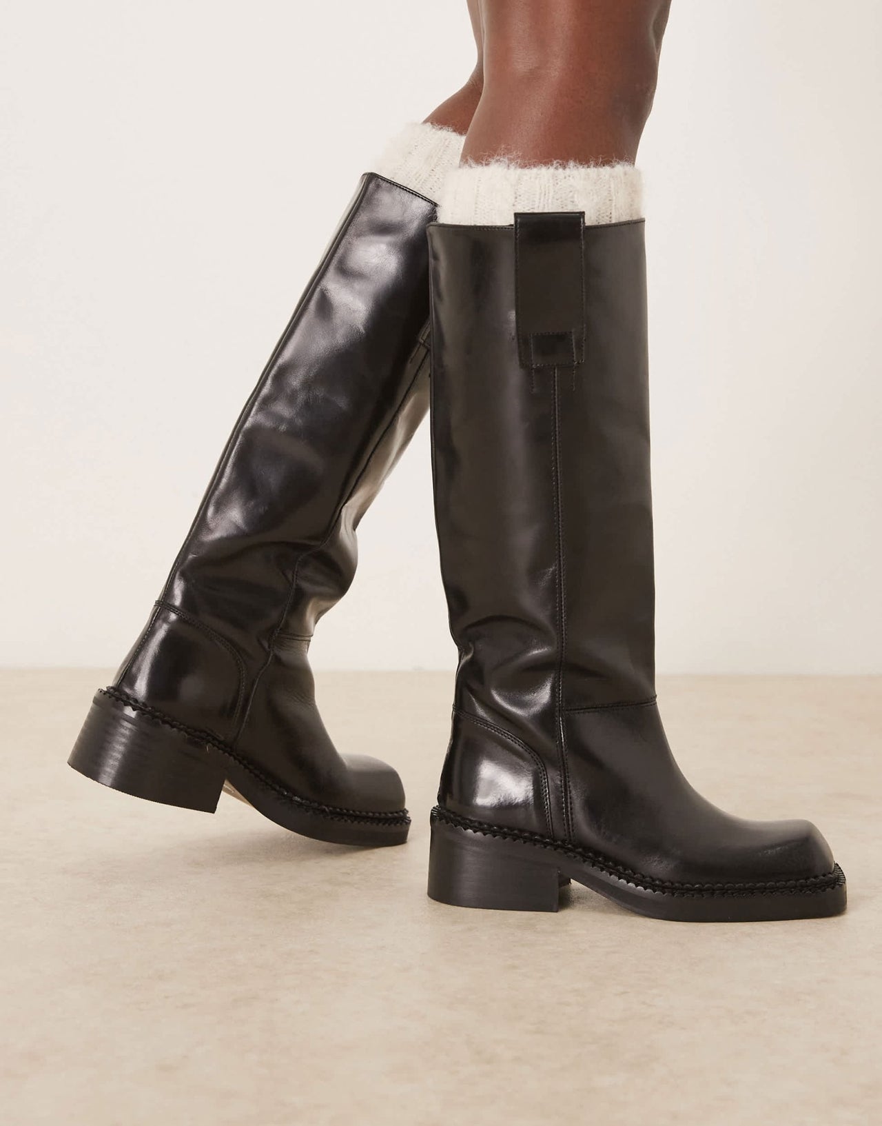 ASOS DESIGN Camelia premium leather knee high trucker boots in black - ASOS Sample Sale