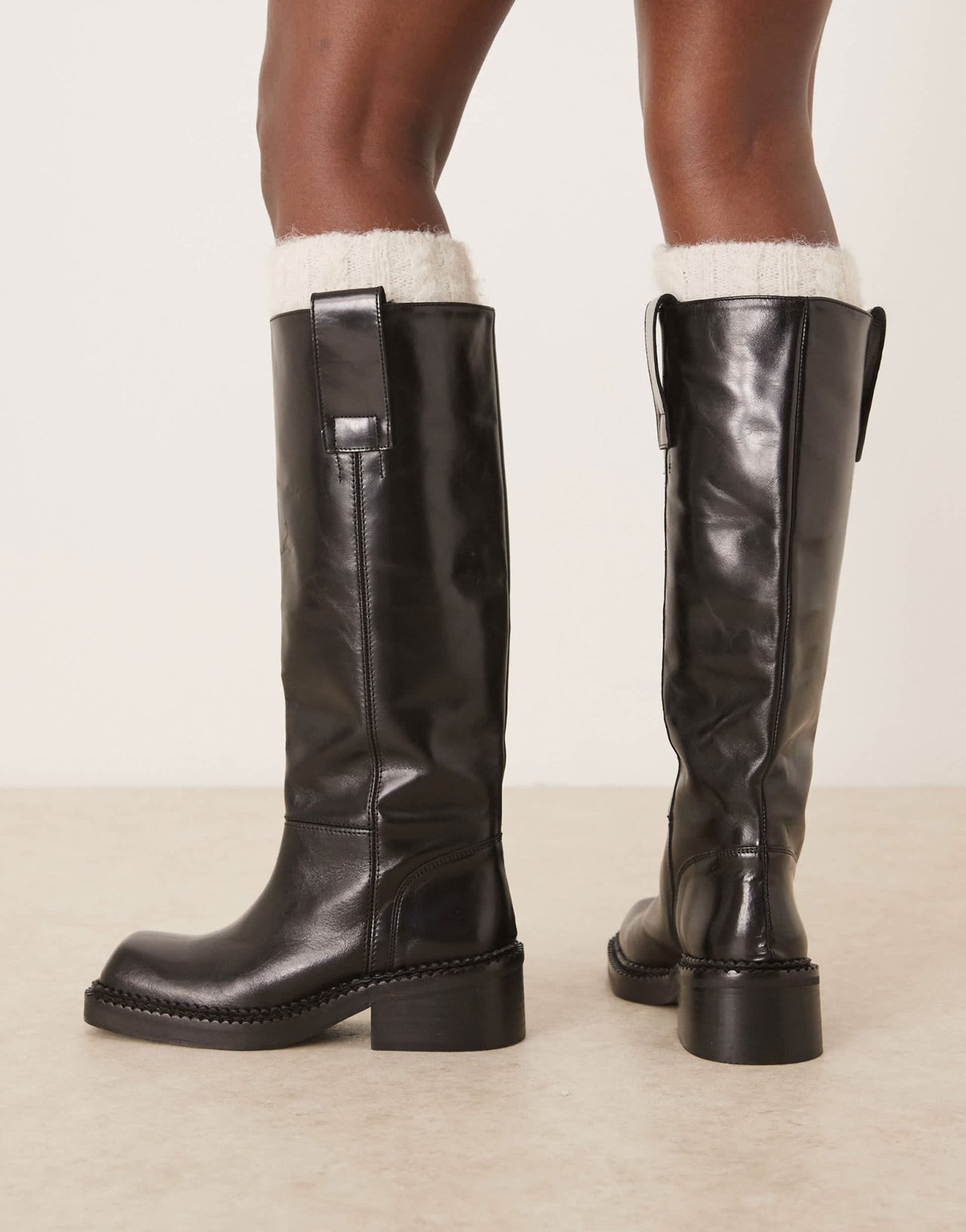 ASOS DESIGN Camelia premium leather knee high trucker boots in black - ASOS Sample Sale