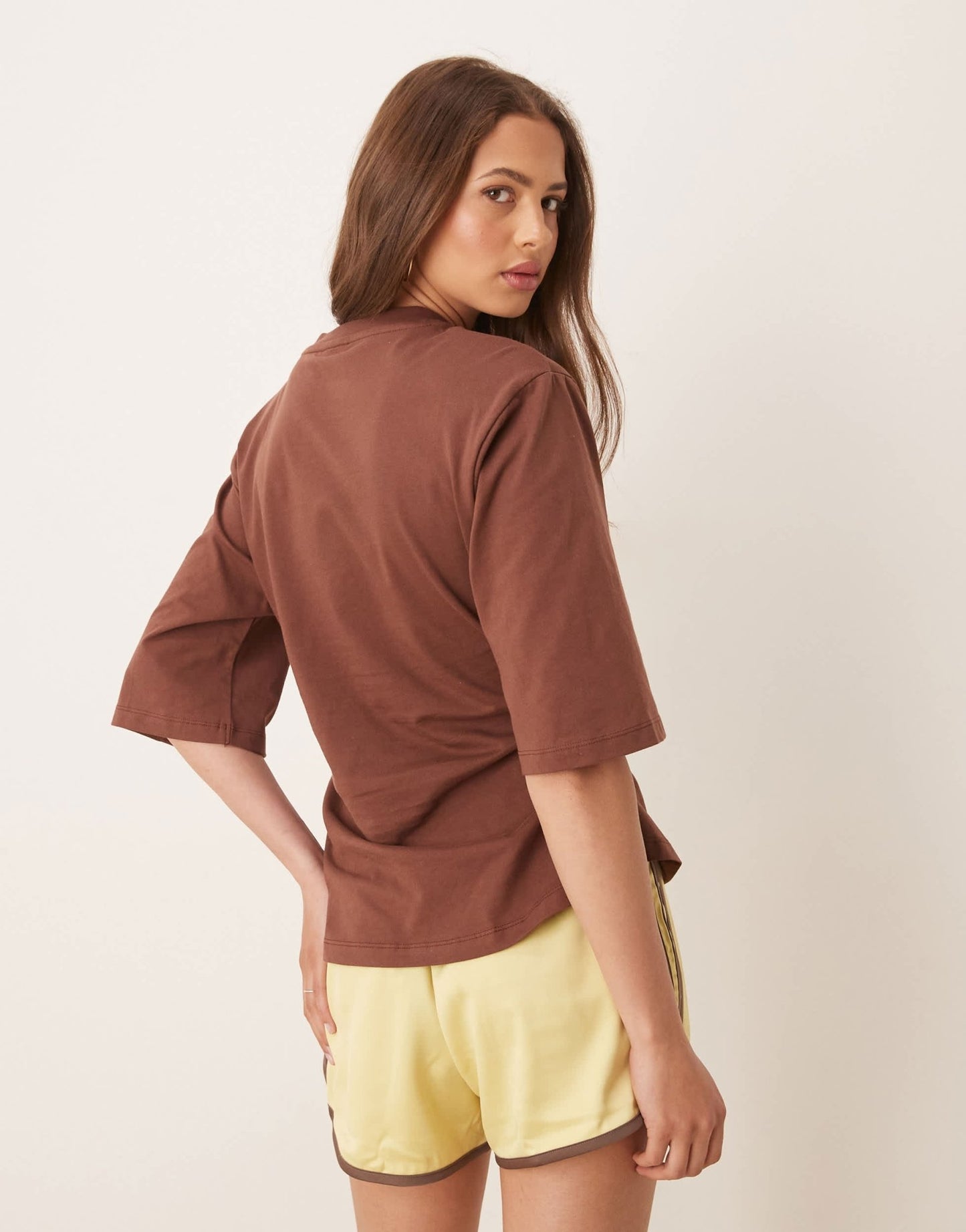 ASOS DESIGN cinched tee with shoulder pads in brown - ASOS Sample Sale