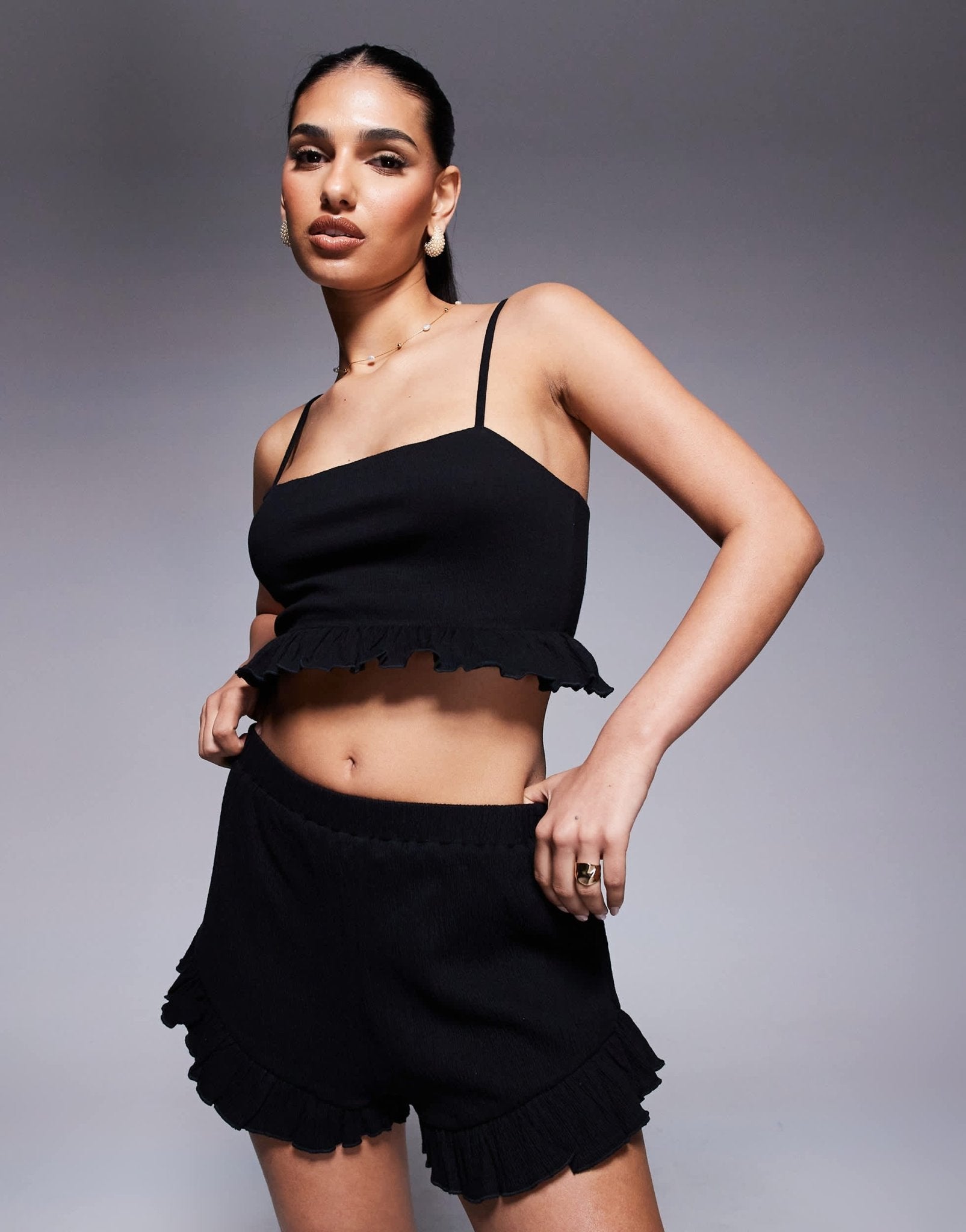 ASOS DESIGN co-ord crinkle flippy shorts with frill hem in black - ASOS Sample Sale