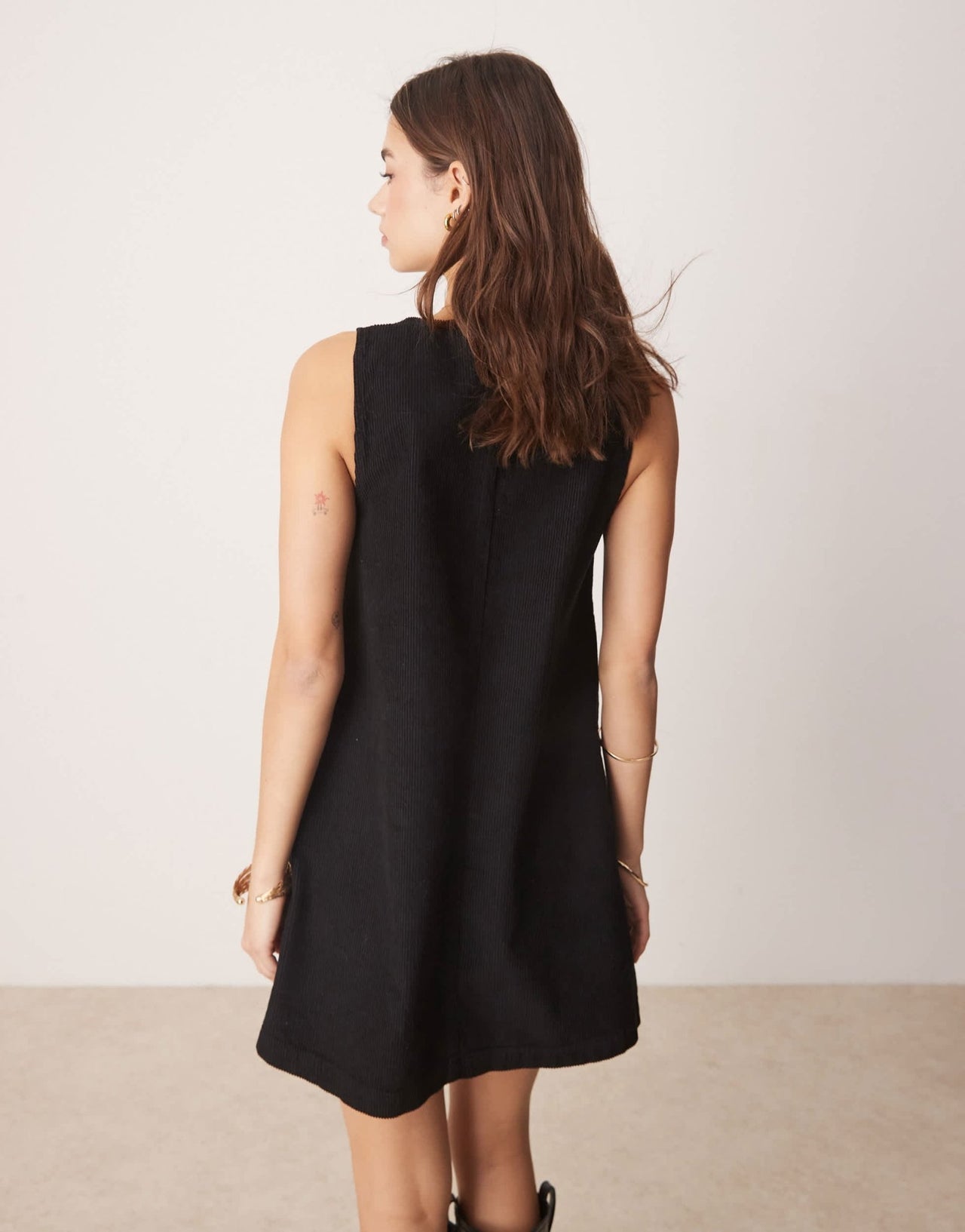 ASOS DESIGN corduroy pinafore mini dress with oversized pockets in black - ASOS Sample Sale