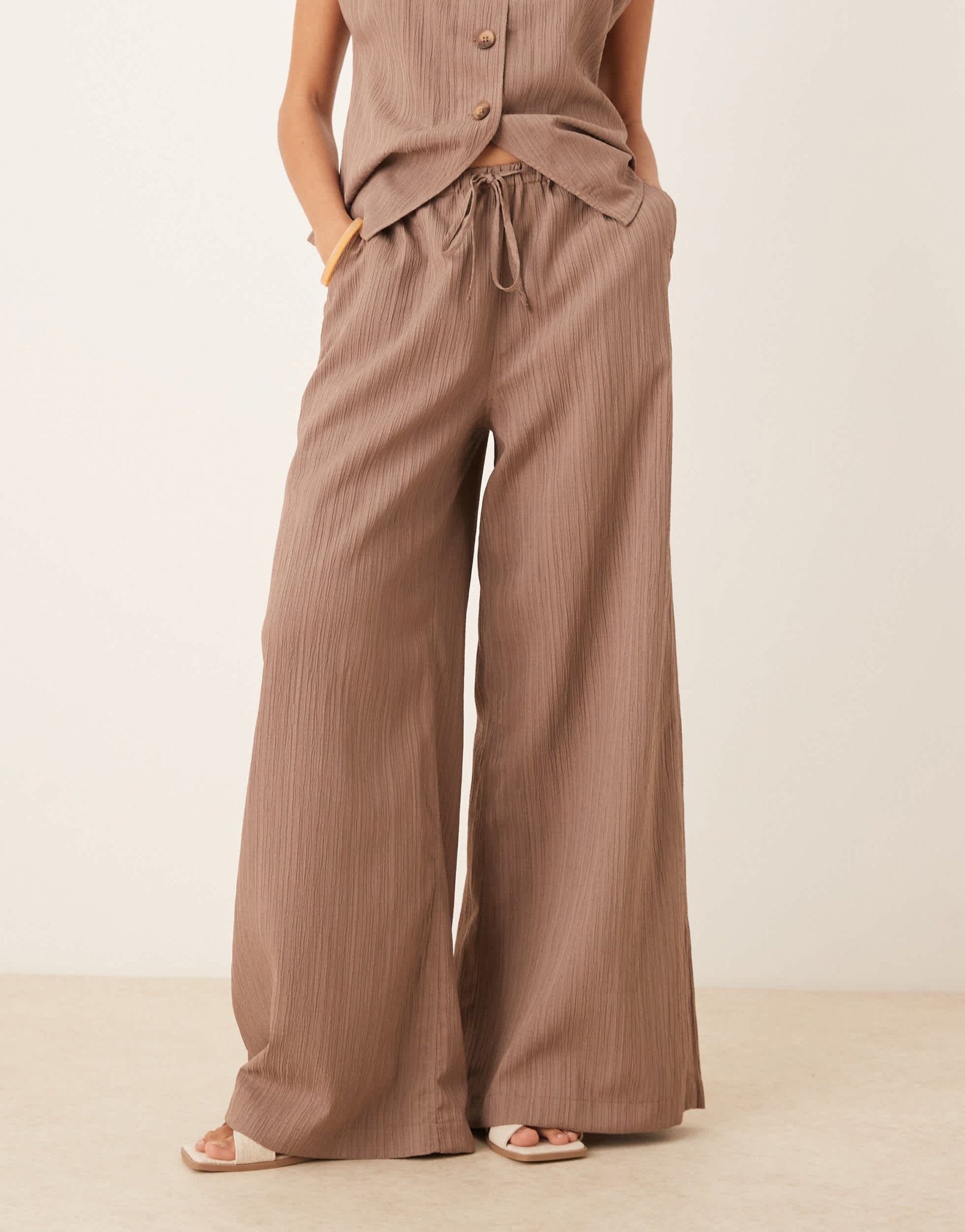 ASOS DESIGN crinkle palazzo trousers co-ord in taupe - ASOS Sample Sale
