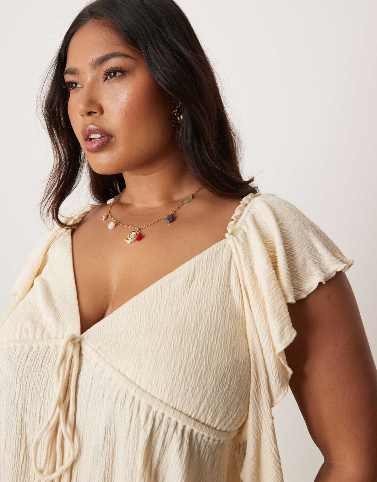 ASOS DESIGN Curve crinkle flutter sleeve open back top in cream - ASOS Sample Sale